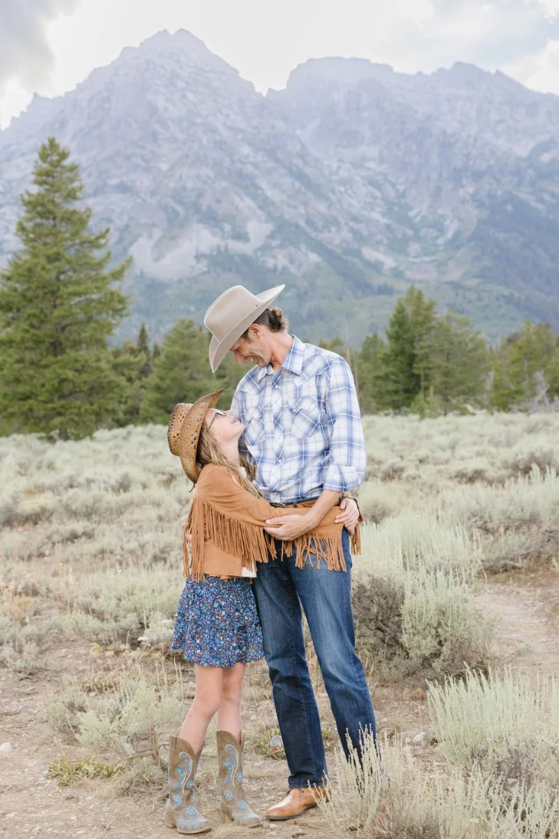  Father and daughter sharing a sweet moment during a Jackson Hole photography session 