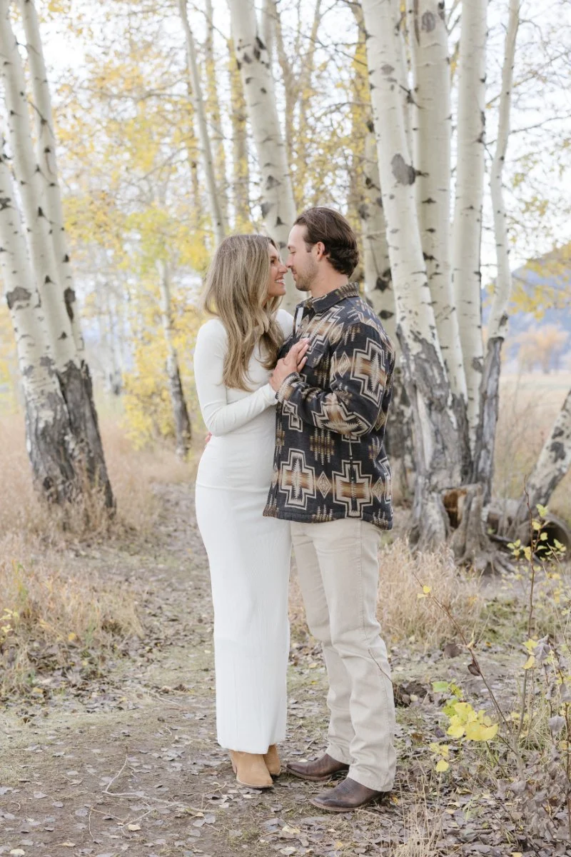  What to wear for a proposal photoshoot with coordinated fall outfits during a romantic Jackson Hole couples session 
