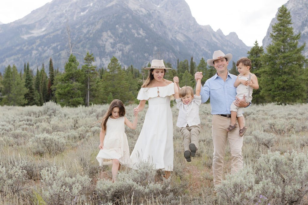 Family of five takes western family photos in Jackson Hole.