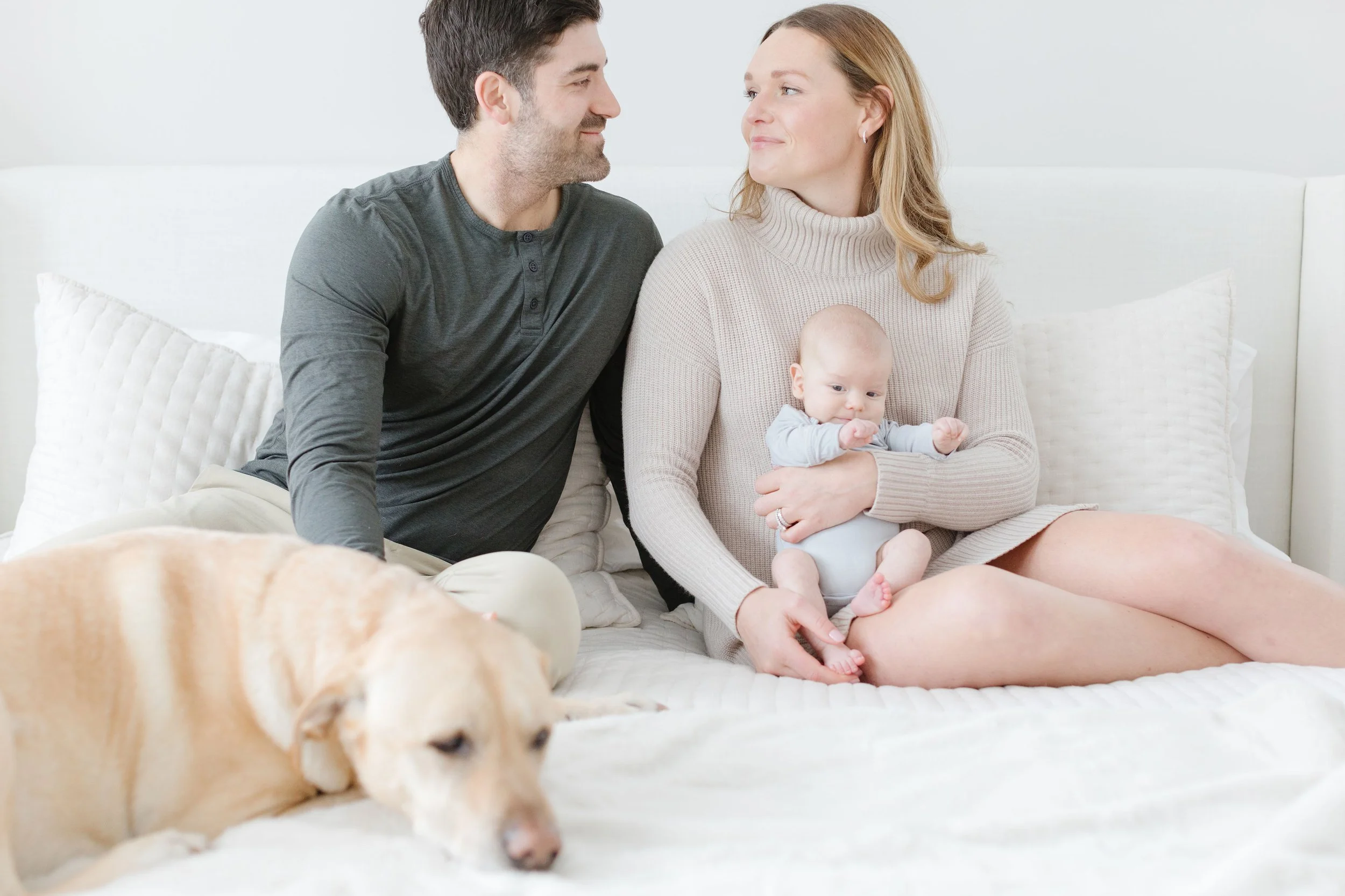 Family with dog photographed by newborn photographer in Jackson Hole.