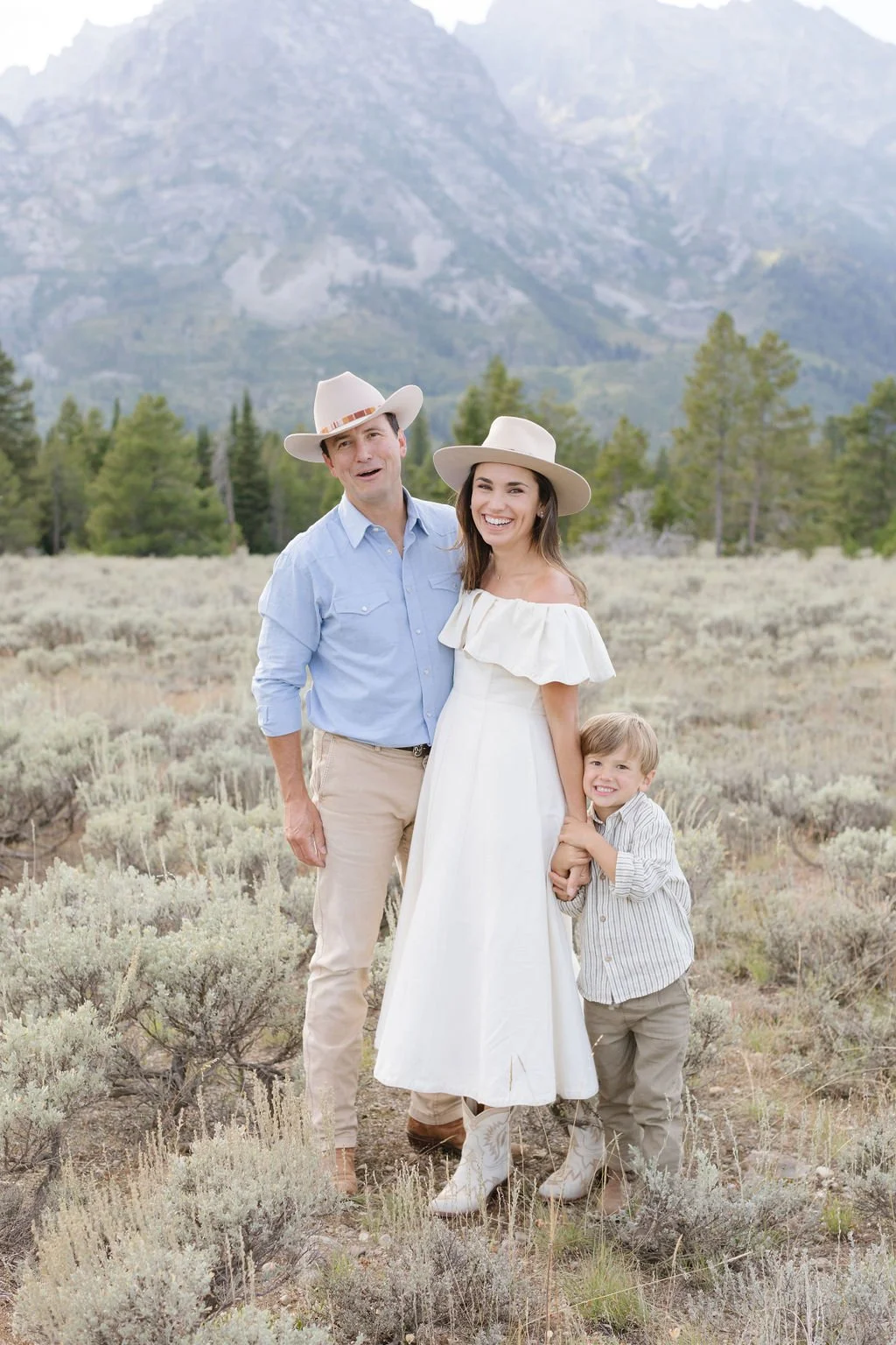 Family smiling for a family photoshoot at Jackson Hole.