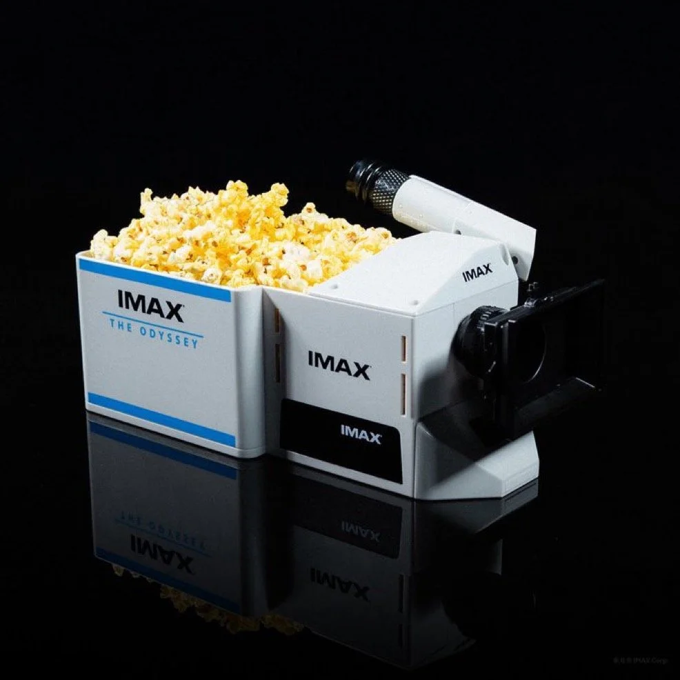The Odyssey’s IMAX Camera Popcorn Bucket Proves Movie Merch Has Reached a New Level