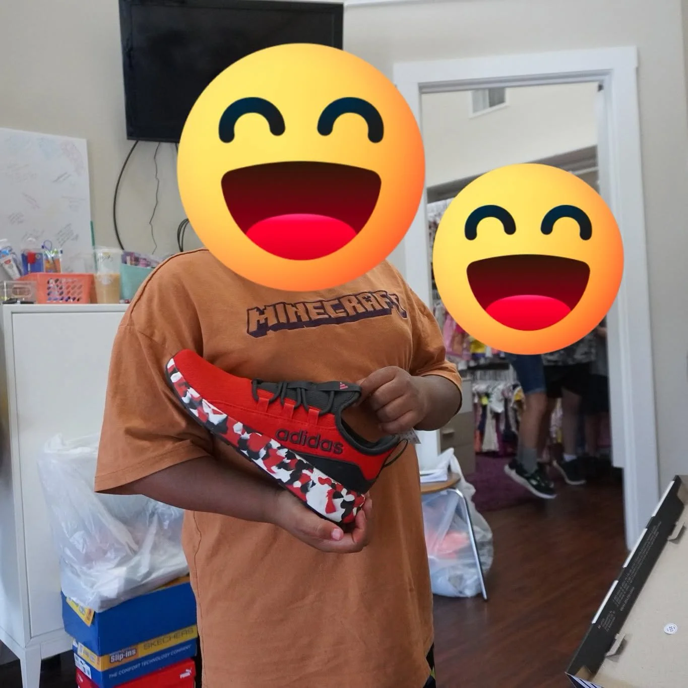A child excited to receive new shoes