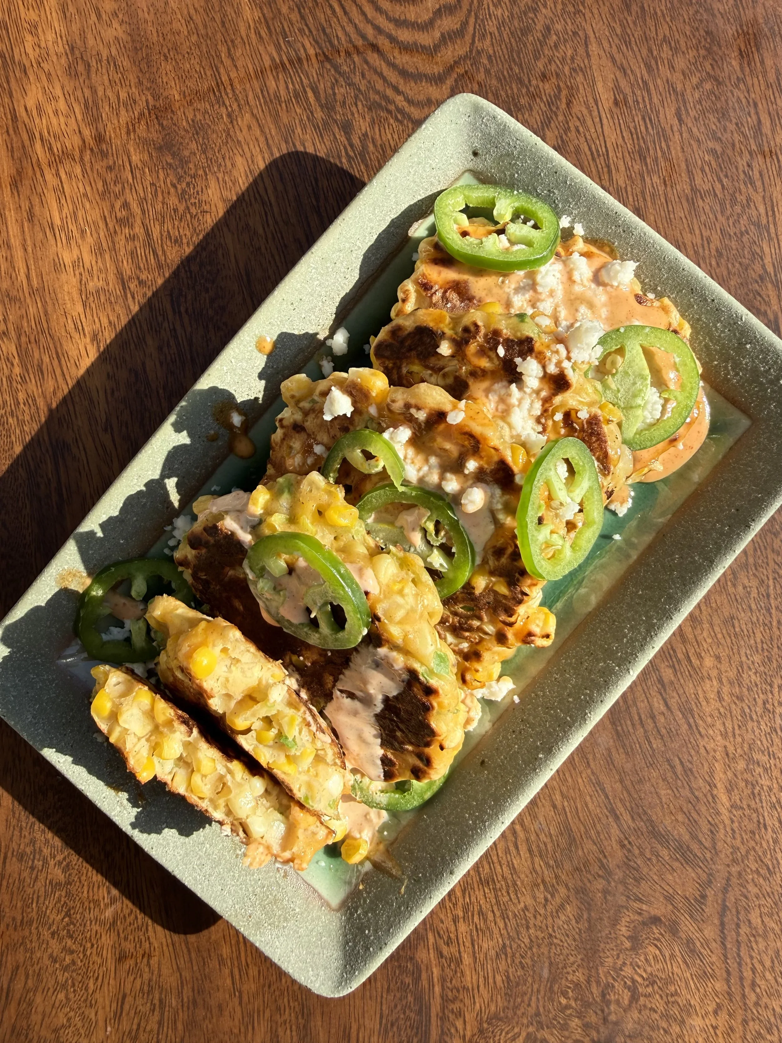 Crispy Corn Fritters w/ Spiced Crema