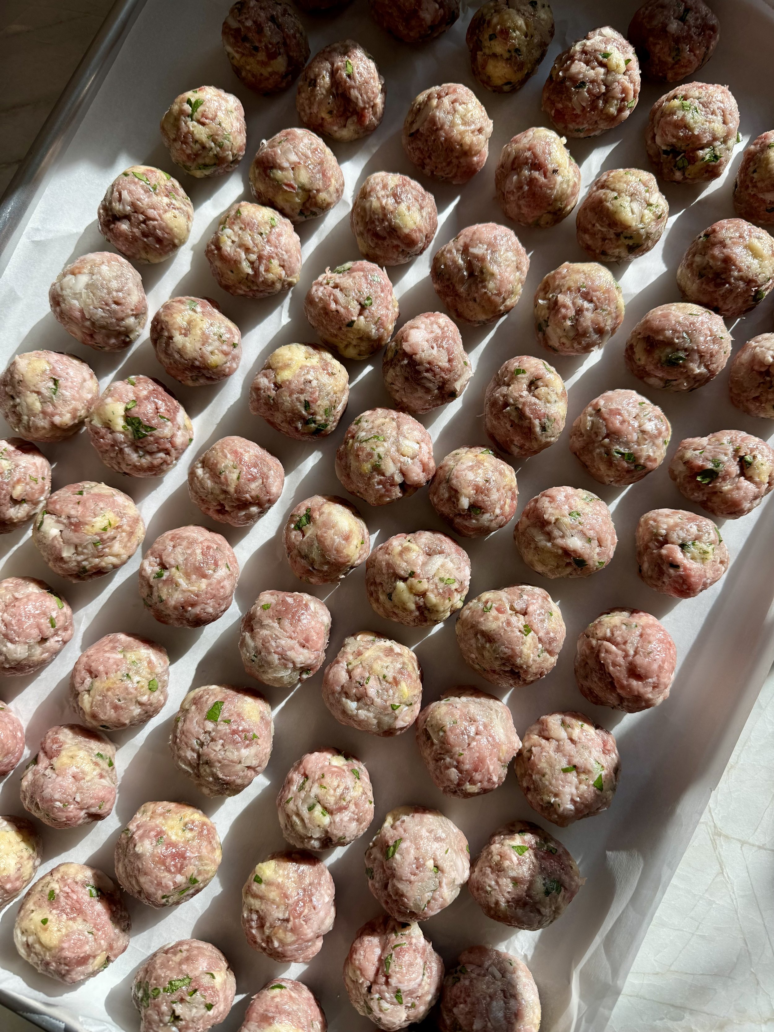 Raw meatballs ready to cook