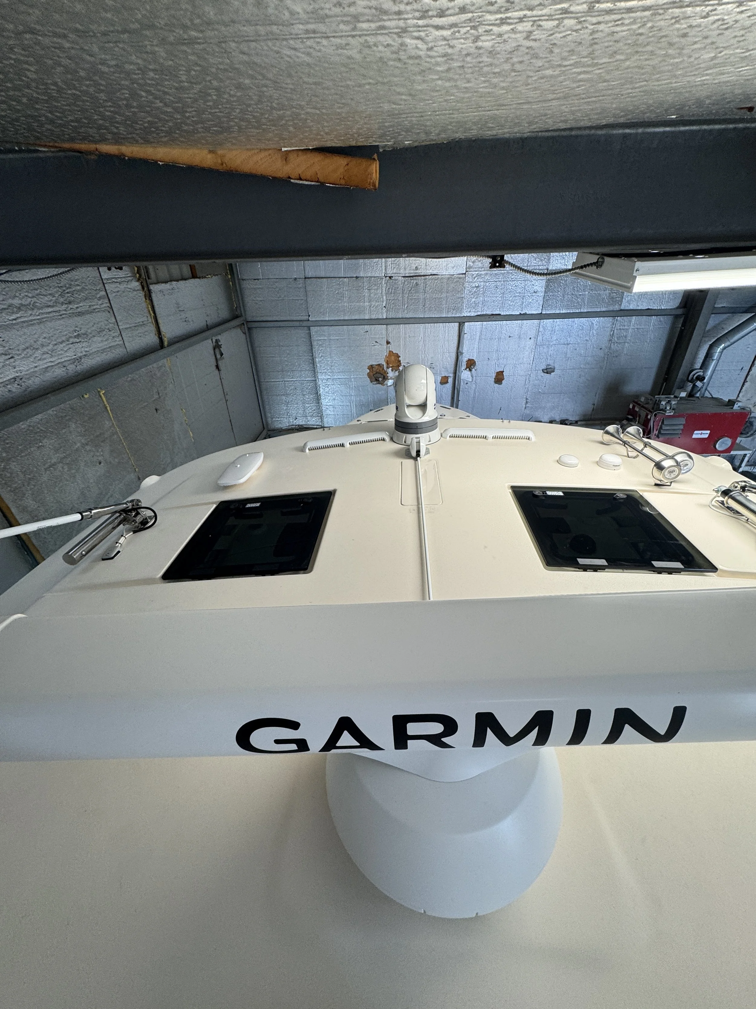Hard top of a 37 grady white with a garmin 4 foot open array and a flir m300 camera