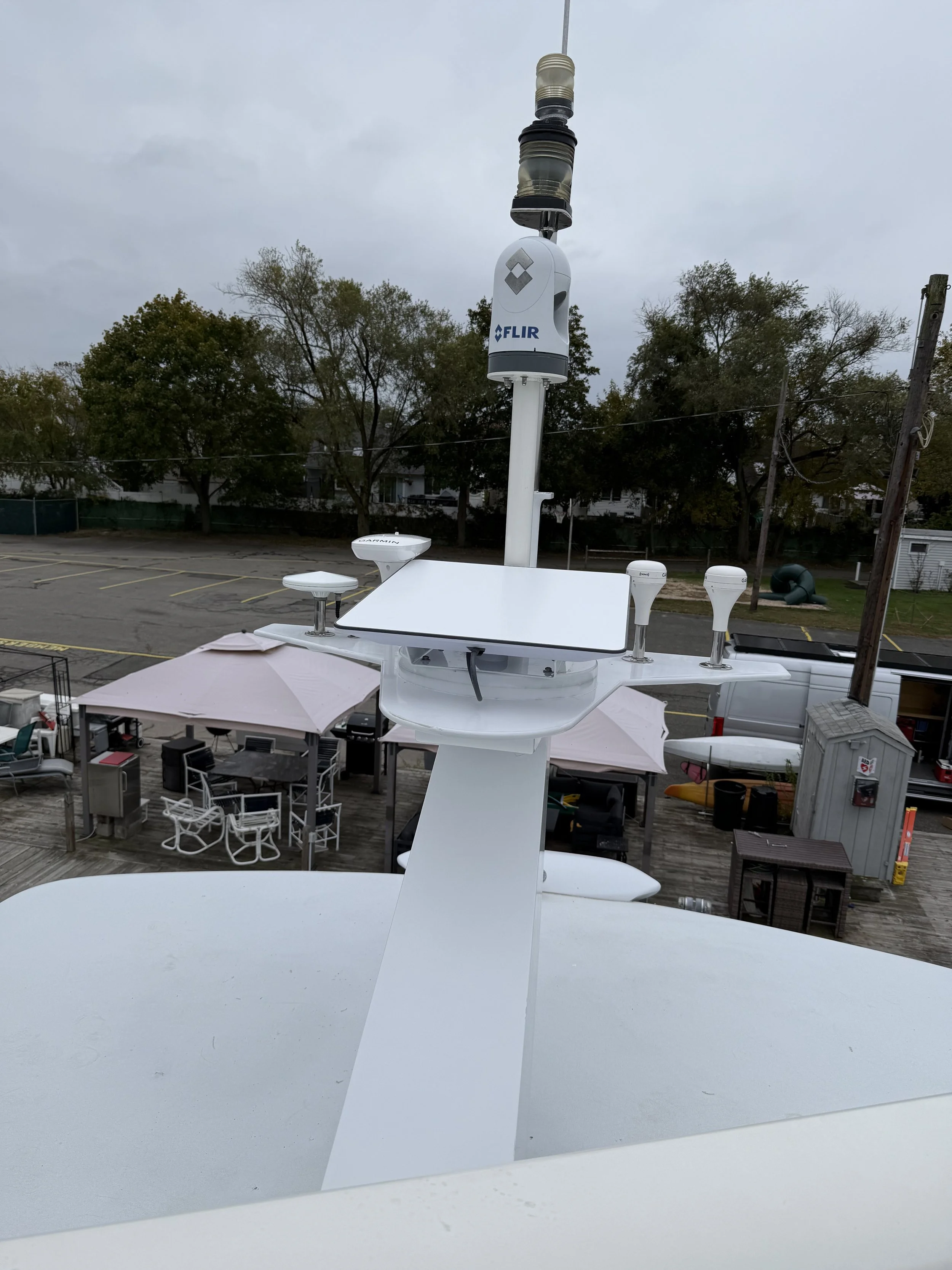 70 Hatteras enclosed fly bridge starlink install