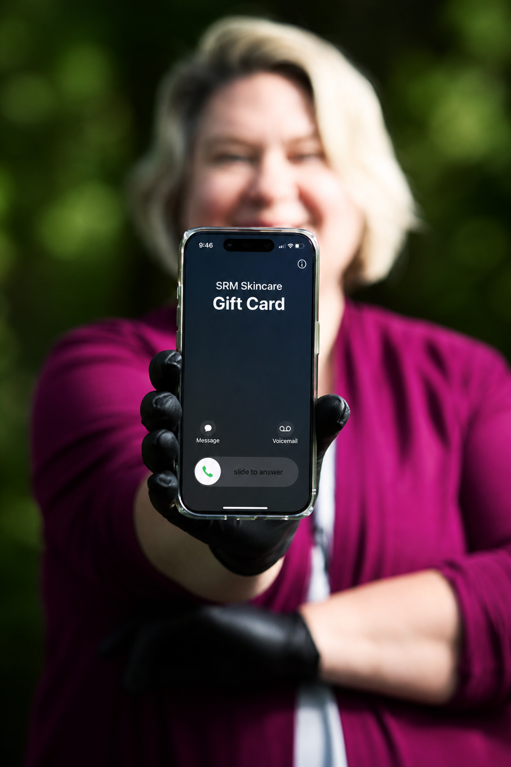 srm holding up her phone that says srm skincare gift card