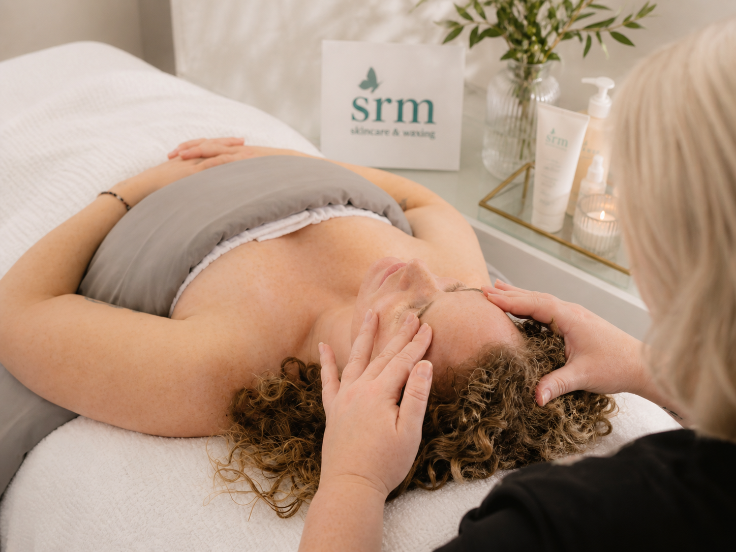 ESTHETICIAN AT SRM SKINCARE & WAXING STUDIO DOING ADVANCE FACIAL TREATMENTS