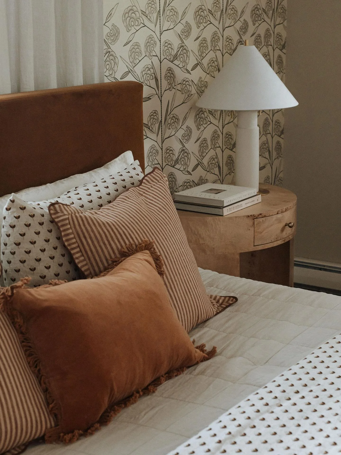 I&rsquo;ve been so excited to finally share this bedroom. My client was such a dream&mdash;she trusted me completely to bring this design to life, and that kind of trust always makes the result so special.&thinsp;
&thinsp;
The deep rust velvet bed an