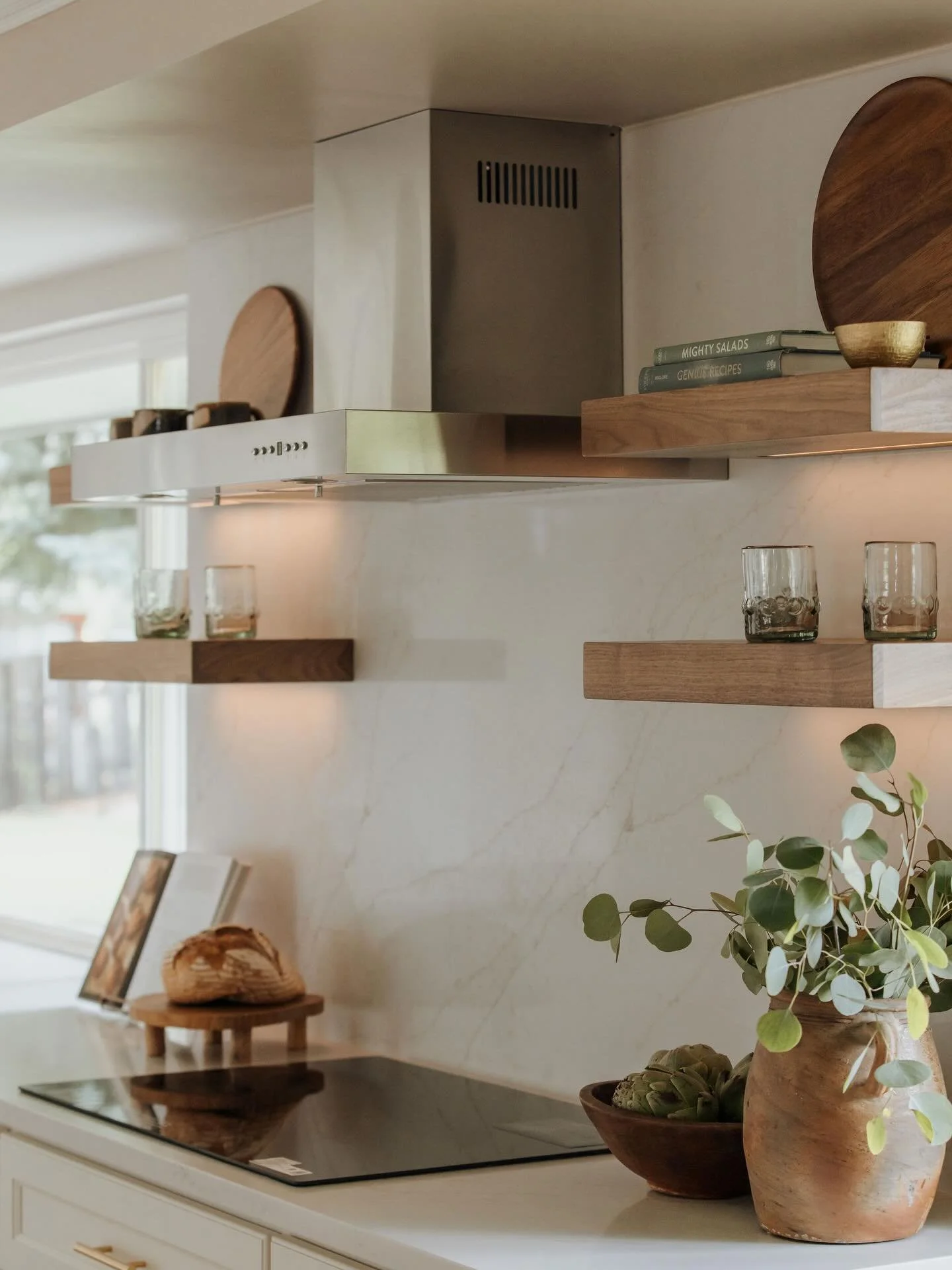 Kitchen details. The trend is moving away from floating shelves, as some people will tell you, but I&rsquo;m still a huge fan. It feels both old European working kitchen and modern at the same time. Add that under shelf lighting and it just works.