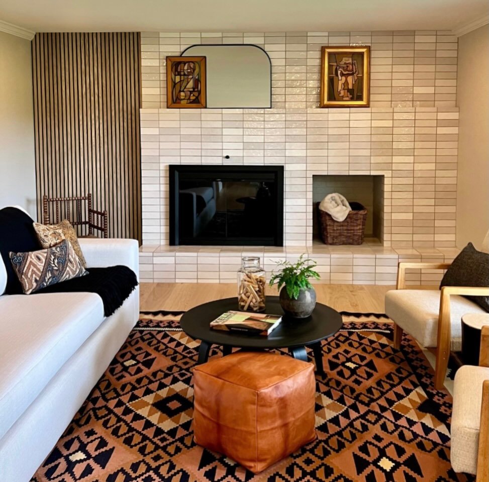 Pattern play. Layering textures, patterns, and textiles. I loved playing with pops of deep orange for this room.