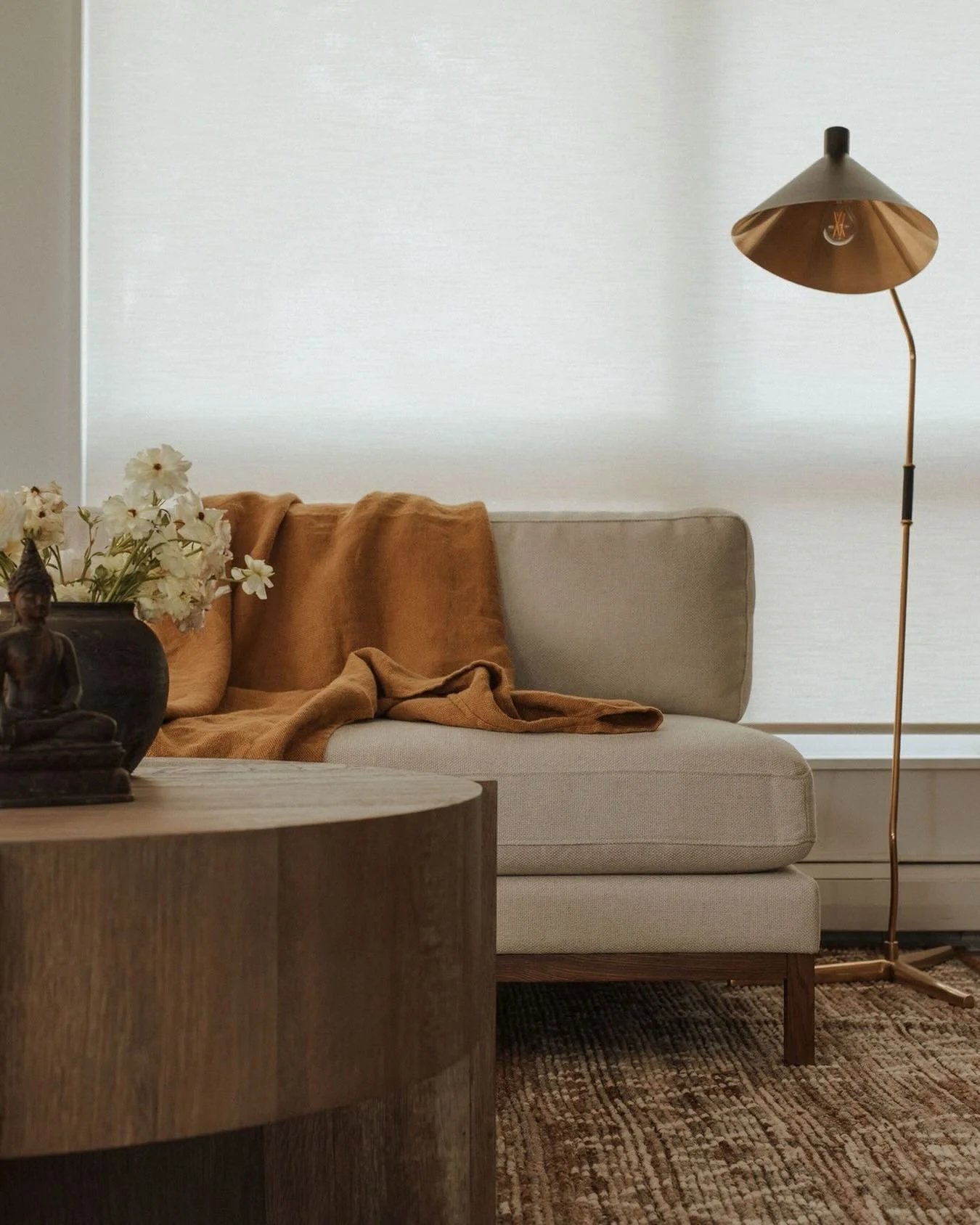 This little corner is a good reminder that not every space needs to work so hard.&thinsp;
&thinsp;
The foundation is simple, a tailored linen sofa in a warm neutral that lets the materials do the talking. It&rsquo;s a performance fabric, which means 