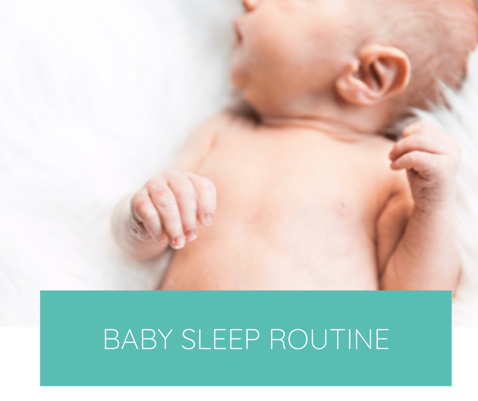 Baby sleeping on white rug