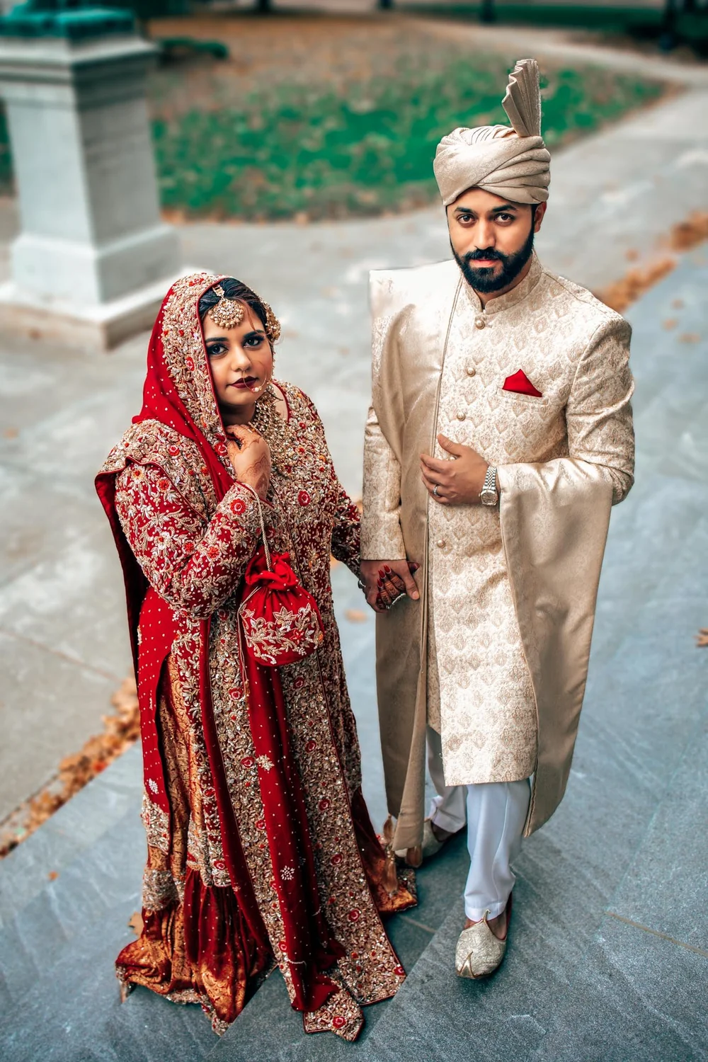 South Asian newlyweds in richly detailed wedding attire photographed by BlackTie Brothers