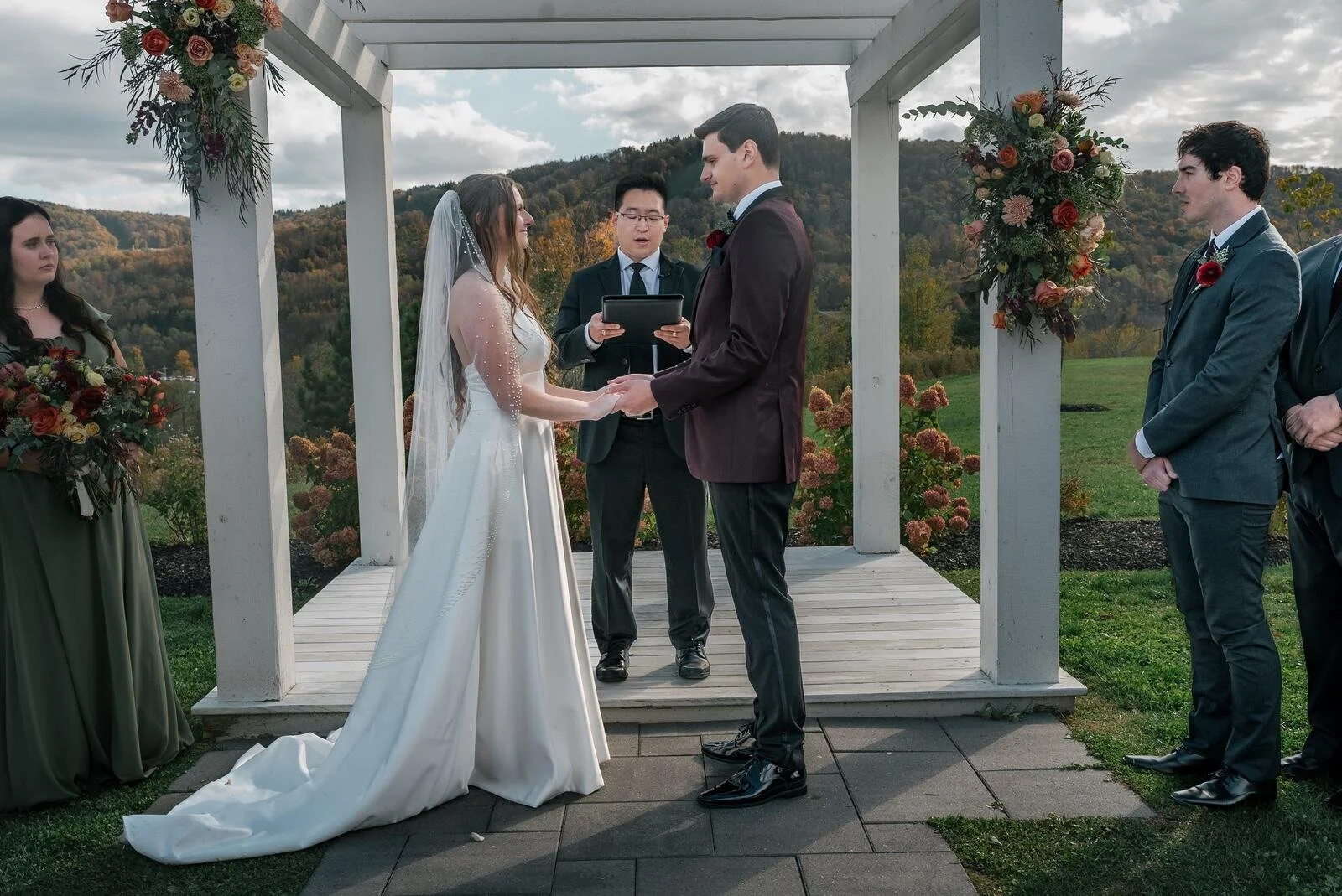 Couple exchanging vows during a Greek Peak wedding ceremony