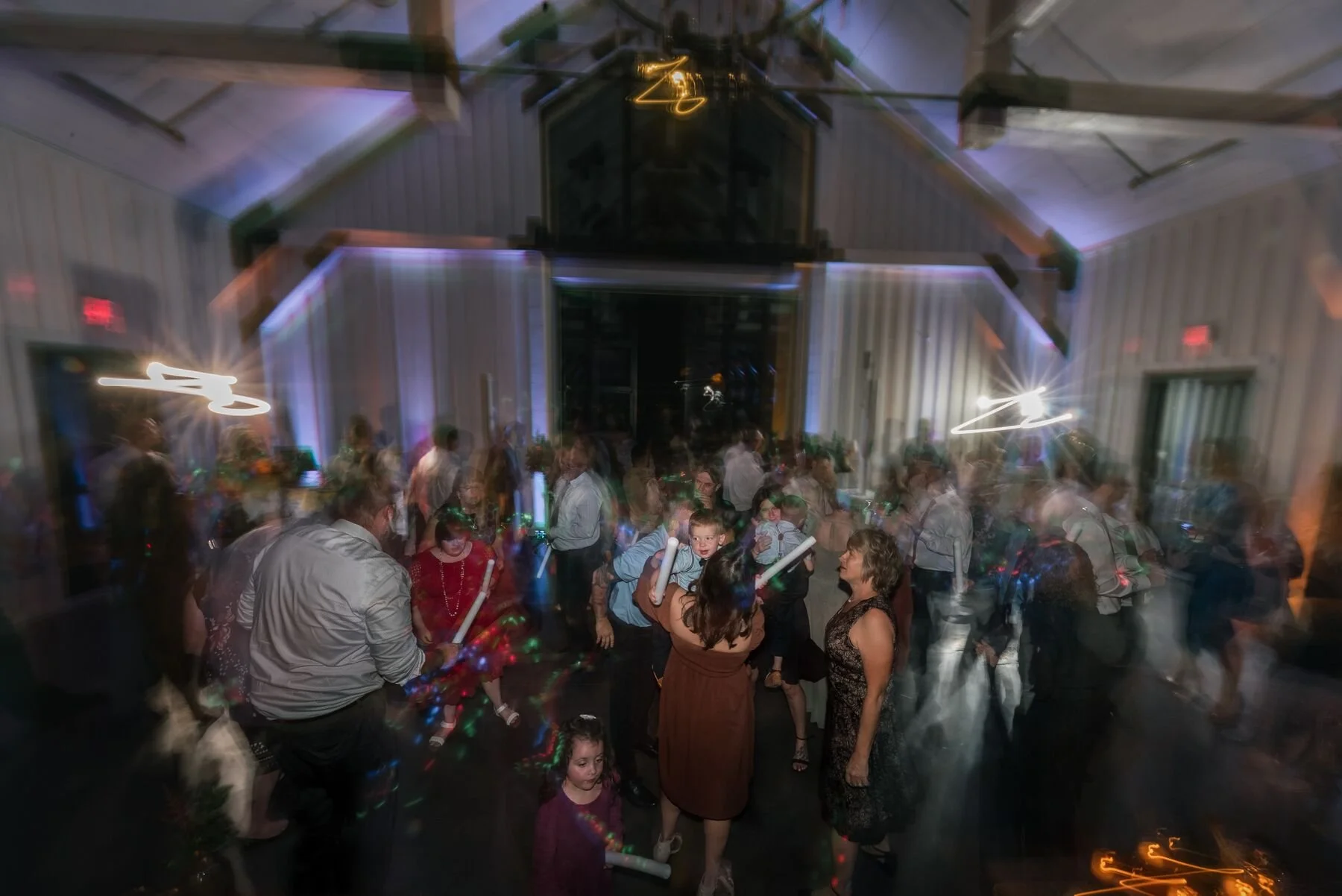 Guests celebrating on the dance floor at a Greek Peak wedding reception
