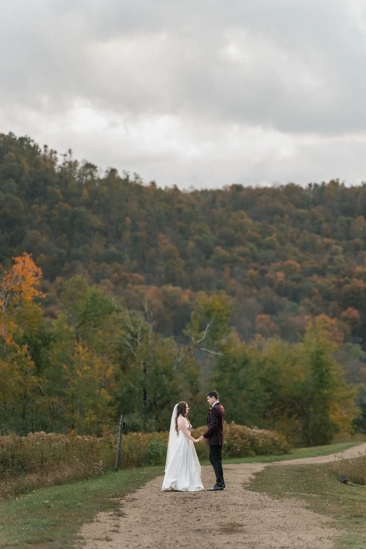 Newlyweds photographed on the mountain at Greek Peak