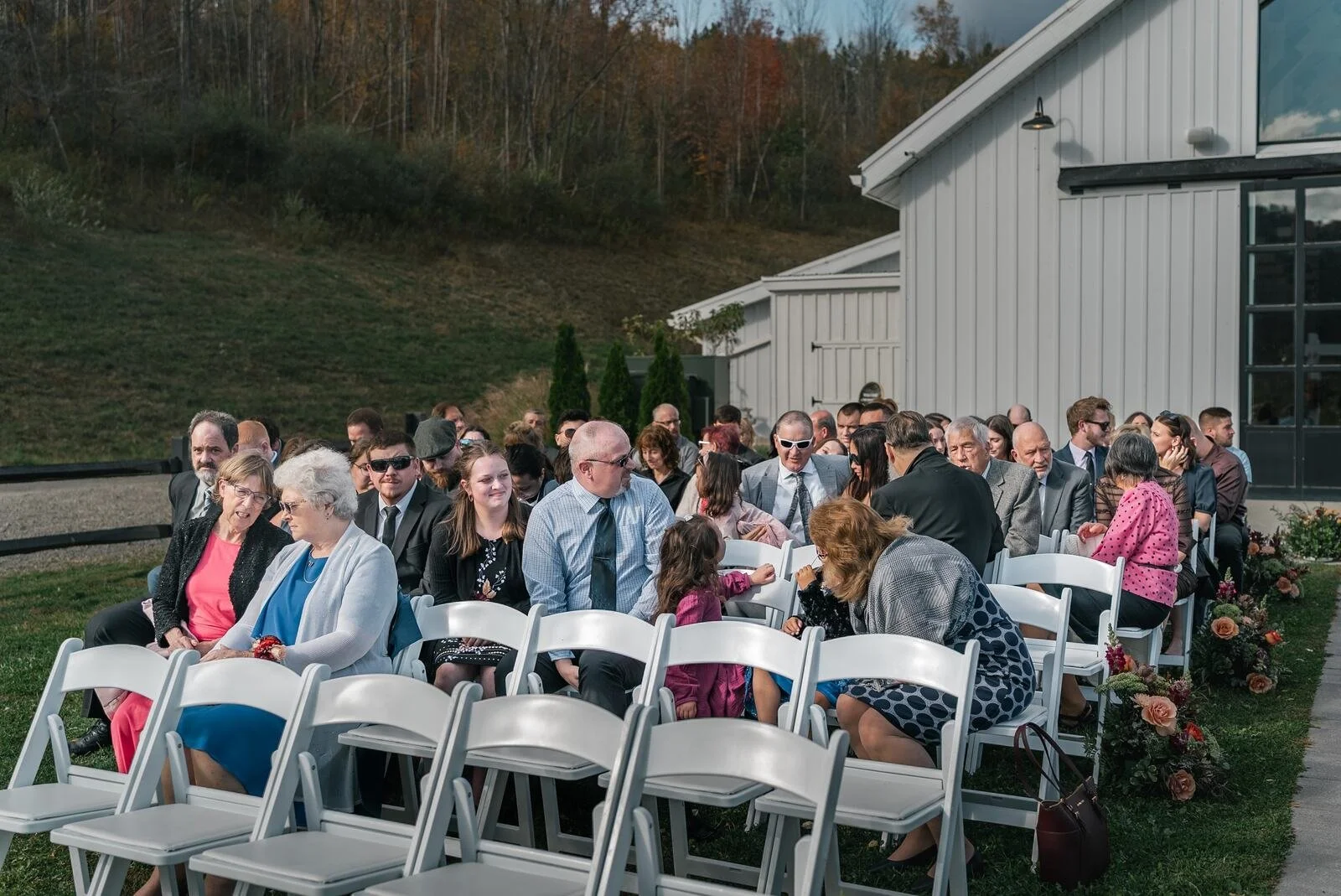 Outdoor wedding ceremony overlooking Hope Lake at Greek Peak