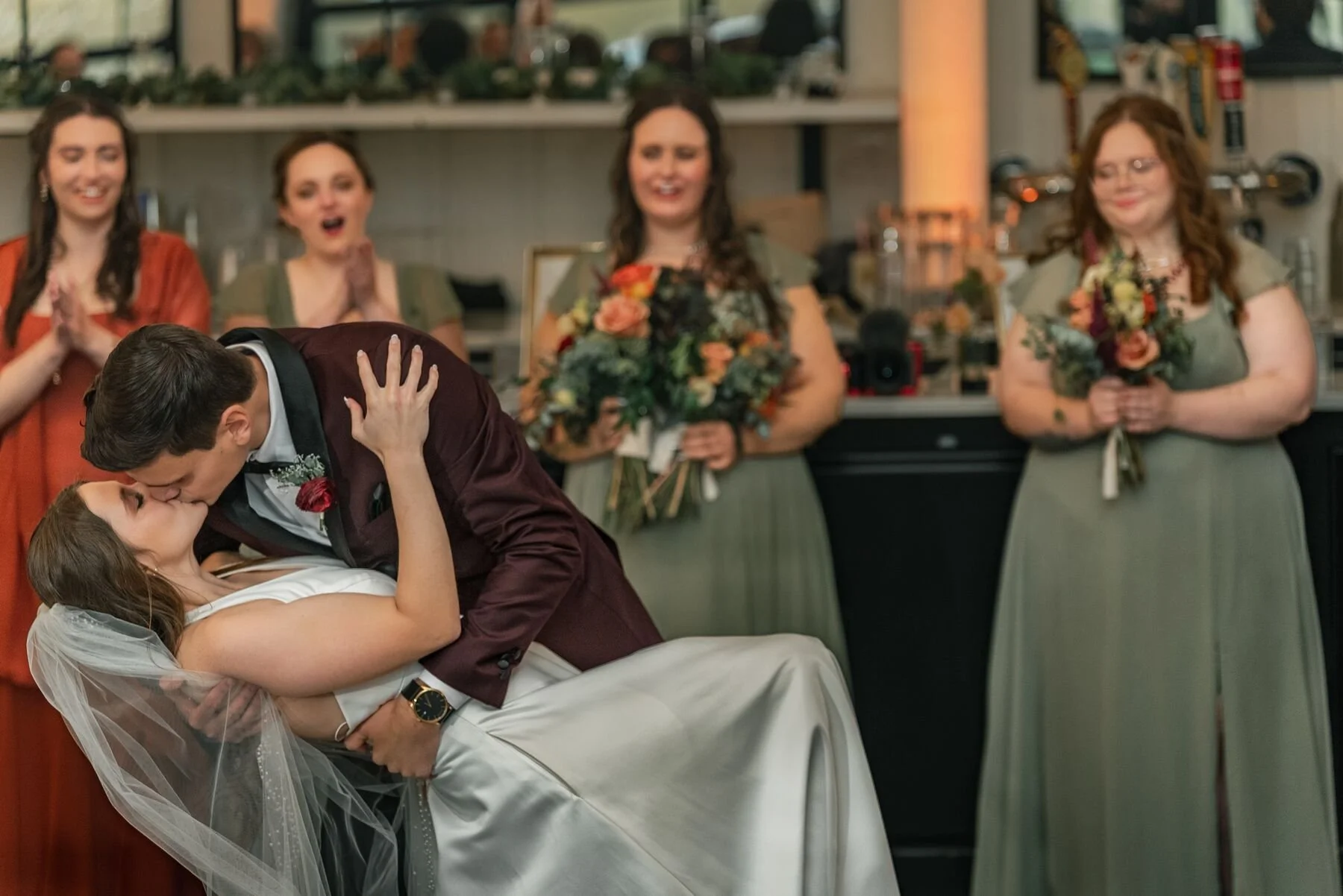 Newlyweds sharing their first dance inside The Lookout at Hope Lake