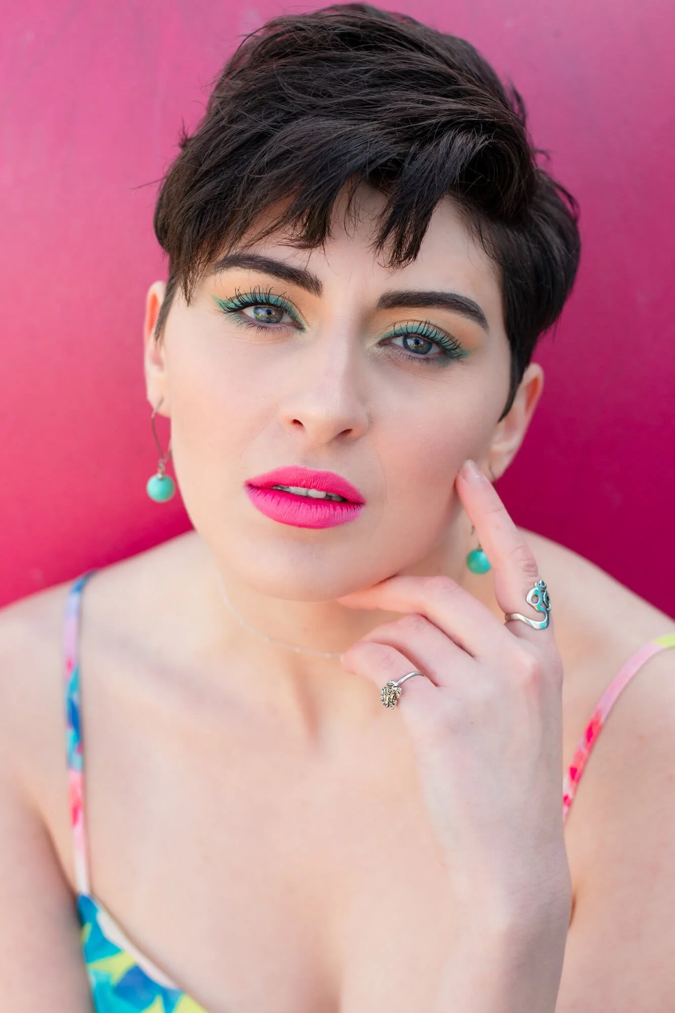 A model looks directly at the camera during a portrait session at the Marbles Museum in Downtown Raleigh.  The session was photographed by PixByDez Photography.
