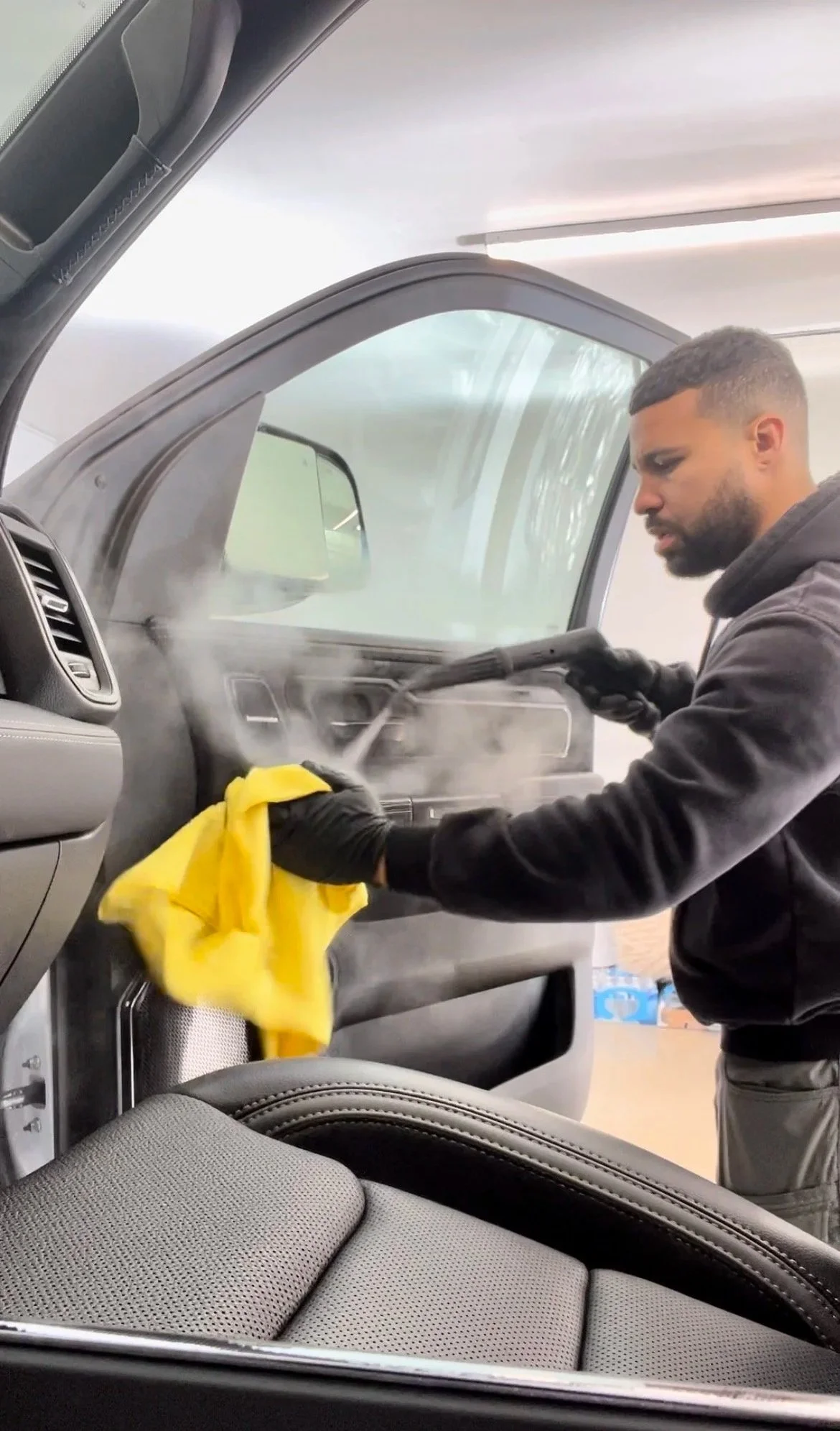 Full interior detailing service in Kansas City showing deep cleaned seats carpets and dashboard restored to like new condition.