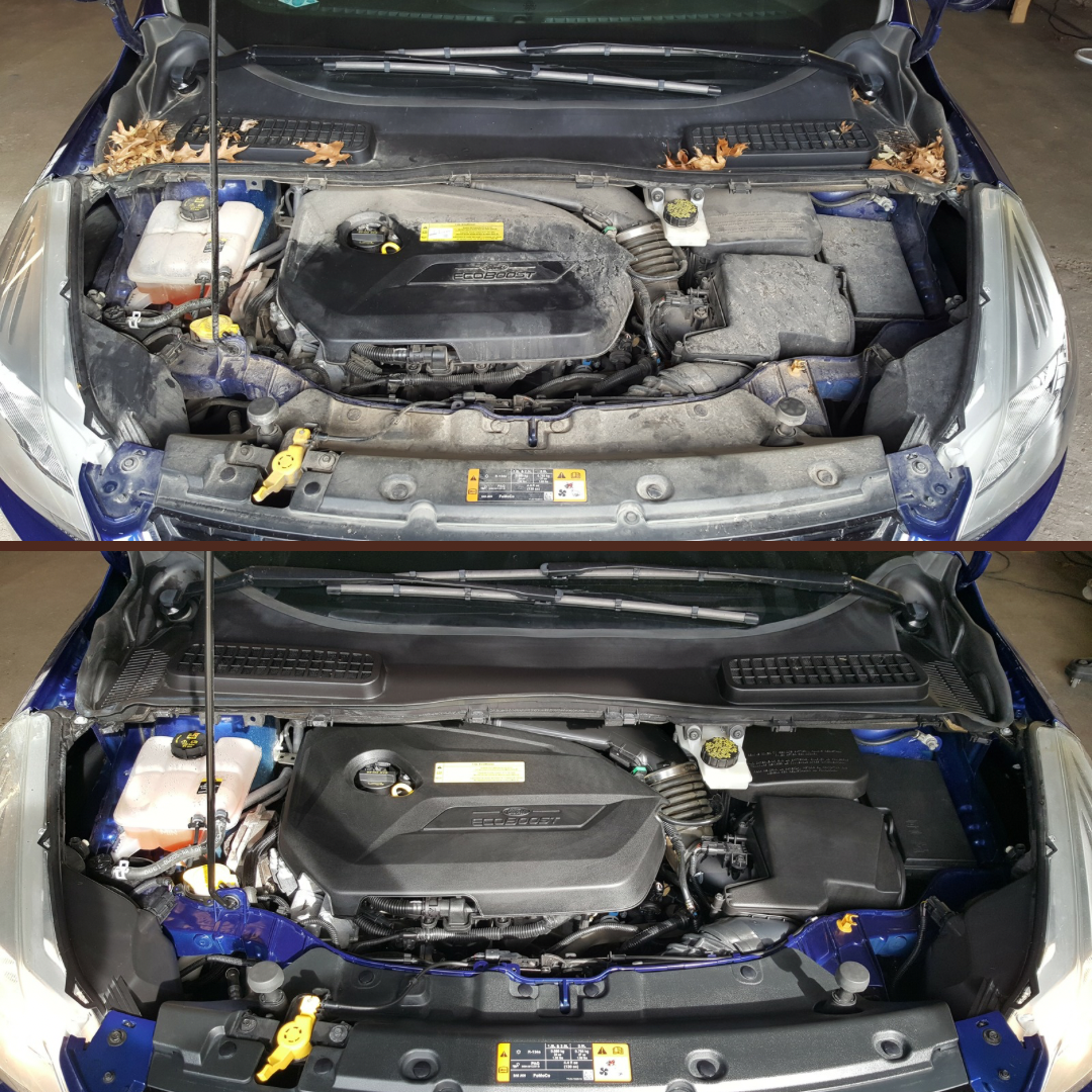 Compressed air being used to dry tight areas inside an engine bay during a safe professional cleaning.