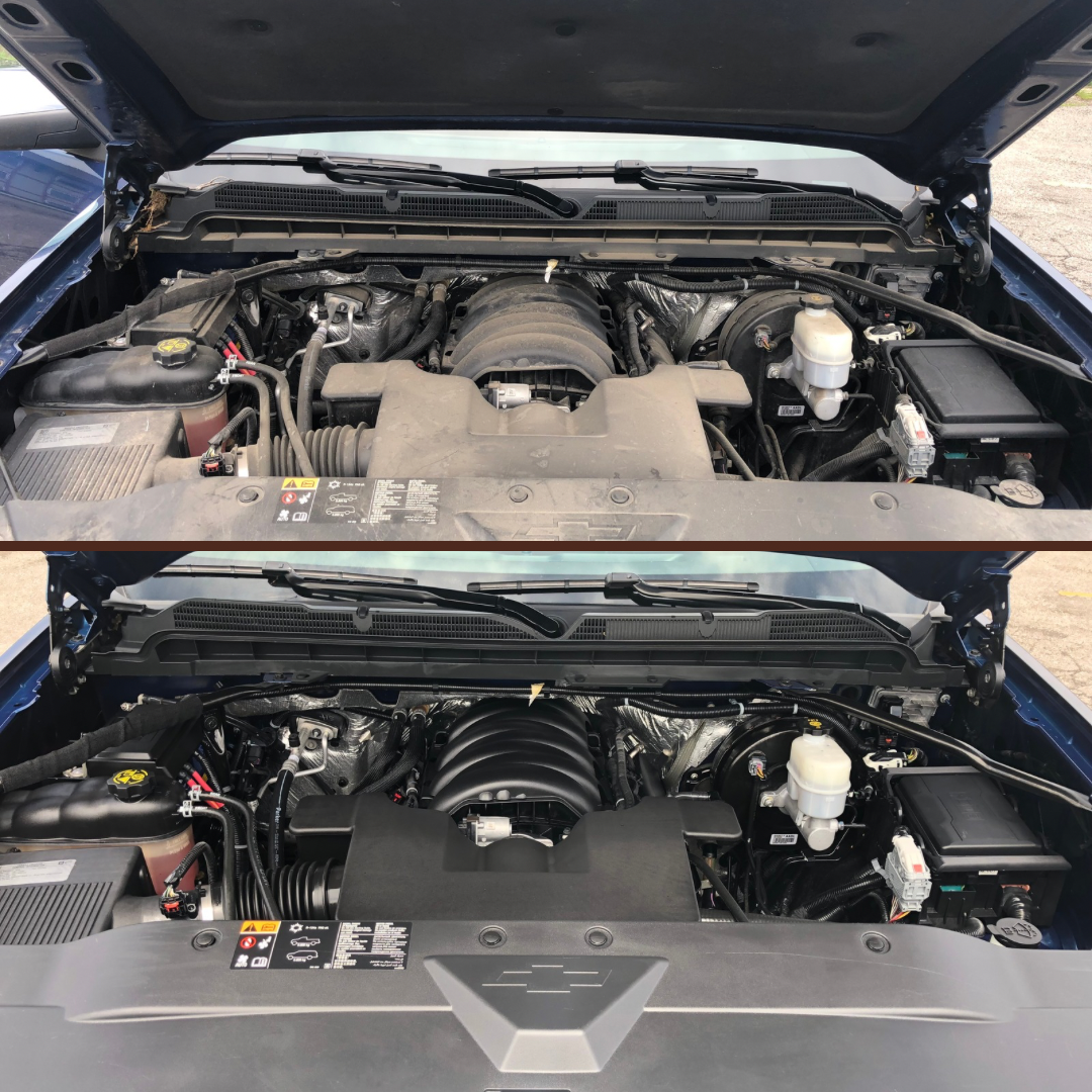 Close up of brushes and cleaners being used to remove dirt and grime from an engine bay during a professional engine detail.