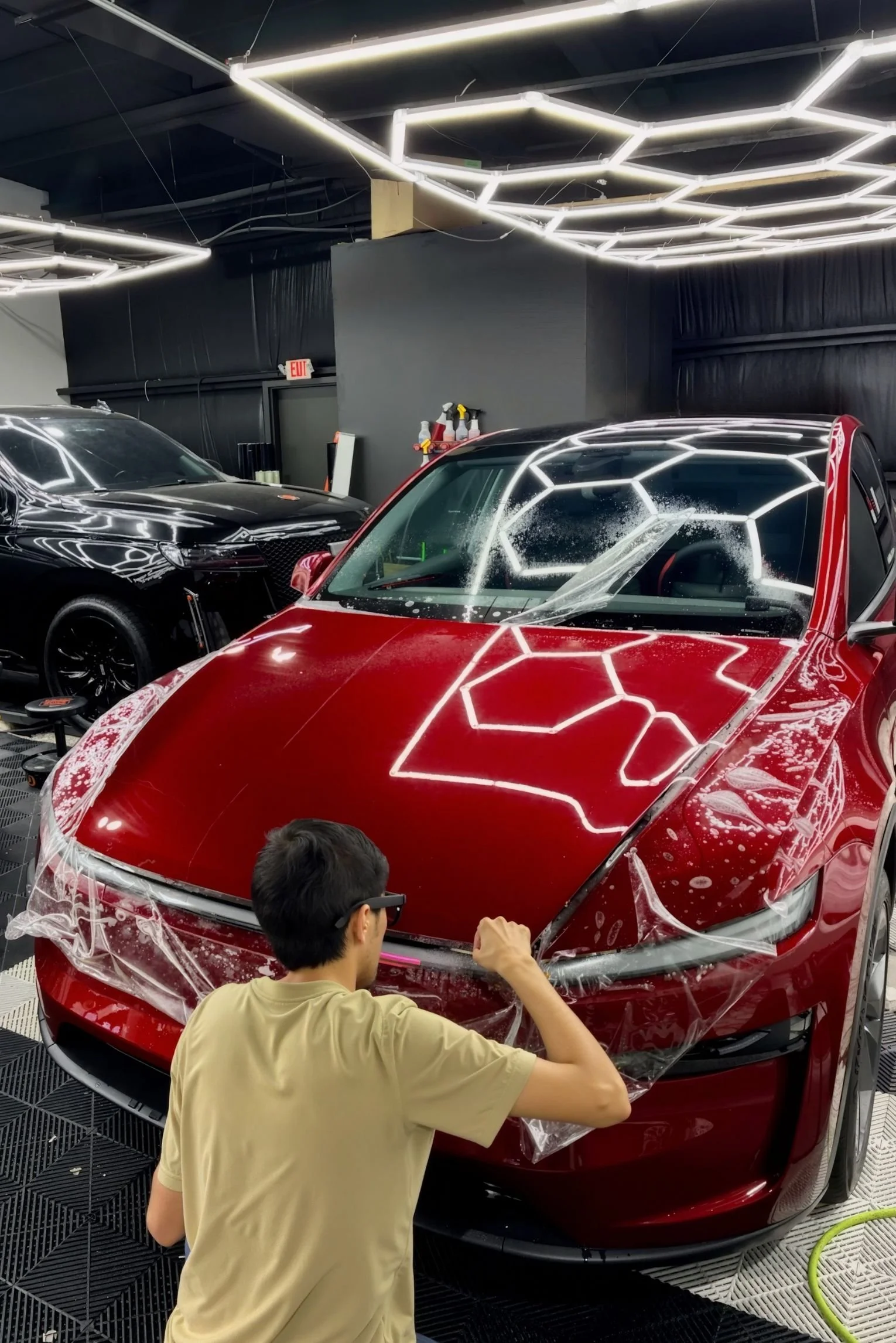 Tesla Model Y window tint installation in Kansas City using ceramic tint for heat rejection and UV protection.