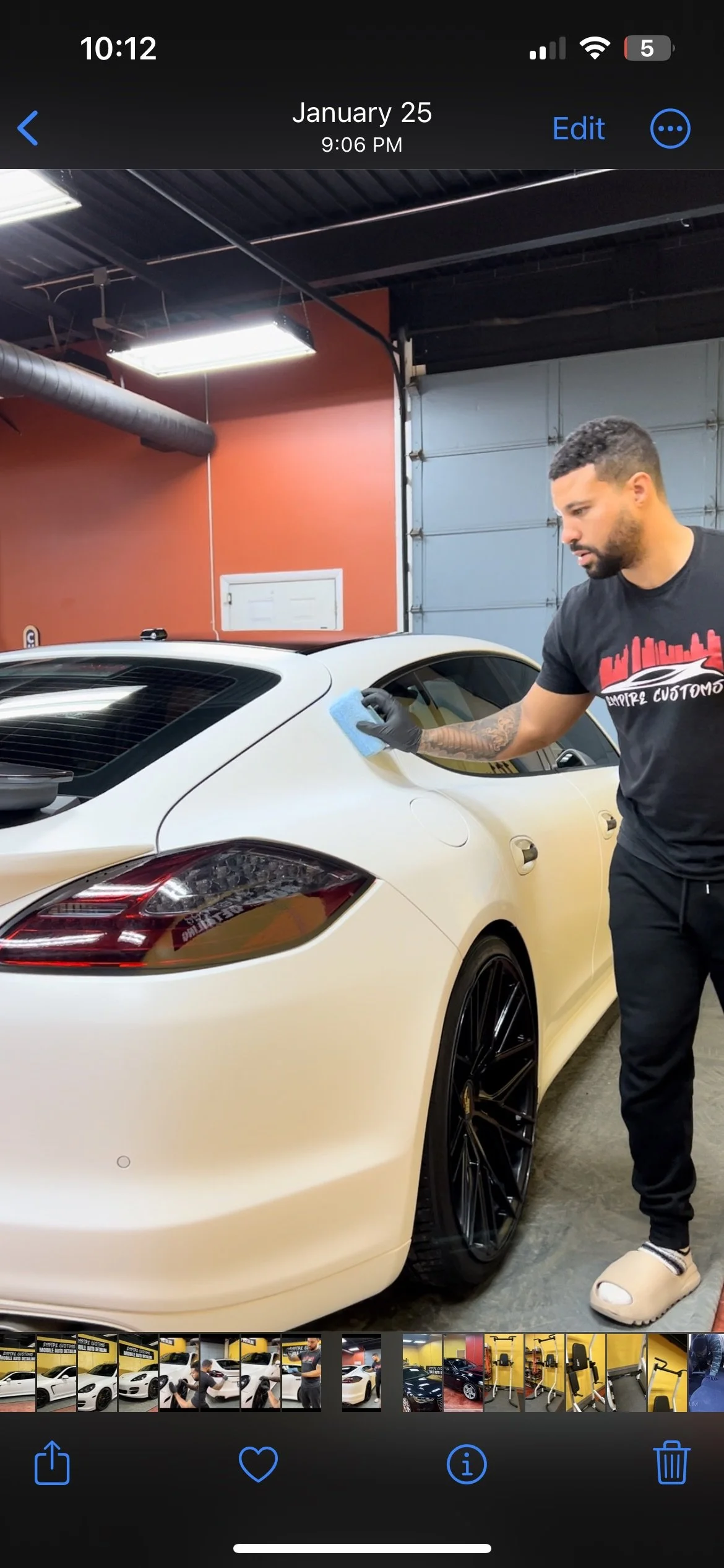 Empire Customs Car Detailing Ceramic Coating & PPF technician performing professional car detailing in Kansas City, deep cleaning the interior and restoring showroom shine to the exterior.