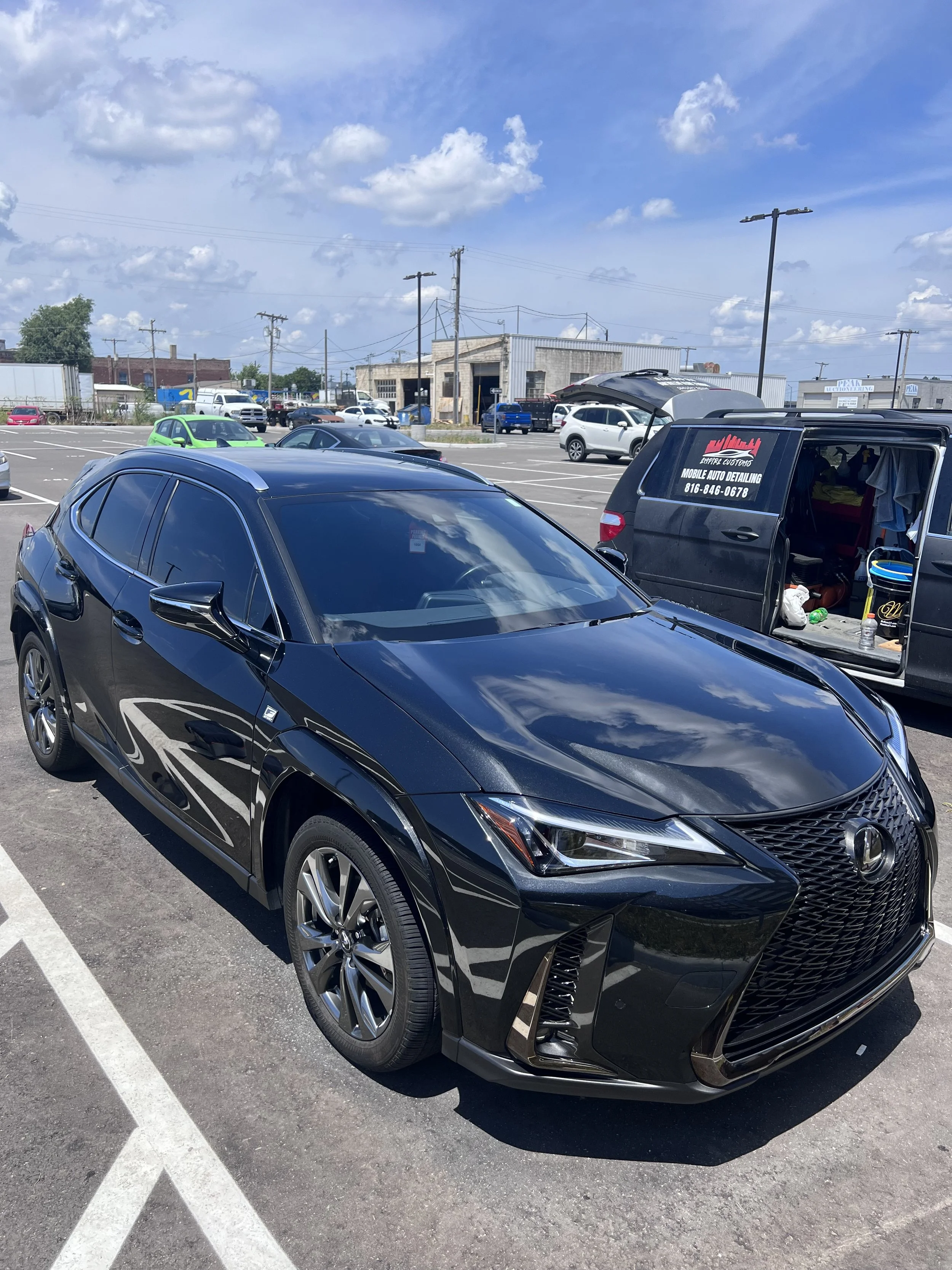 Professional paint correction on a car at Empire Customs Car Detailing in Kansas City restoring gloss removing swirl marks and enhancing clarity for a showroom shine.