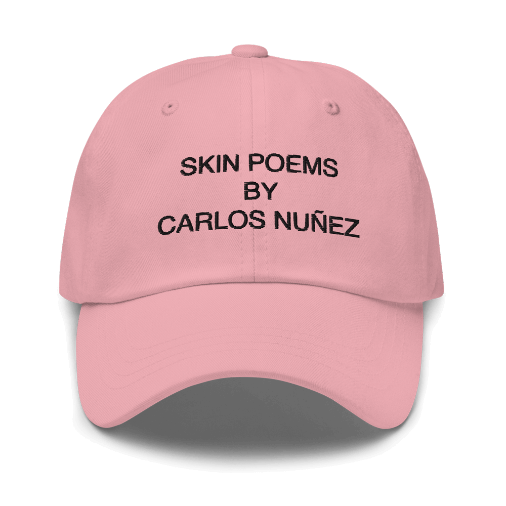 Pink with black embroidery Skin Peom hat by tattoo artist Carlos Nunez.
