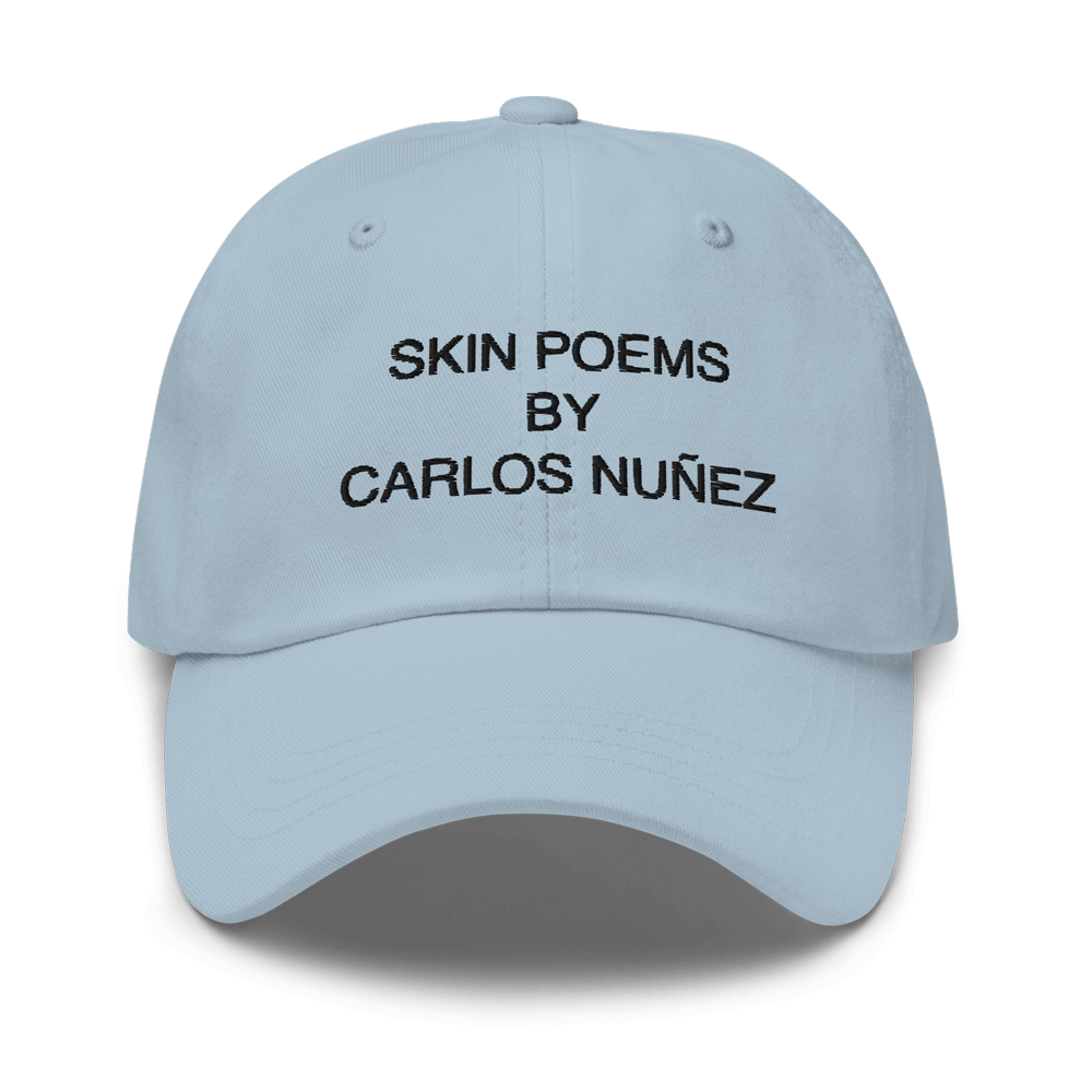 Baby blue Skin Poem hat by artist Carlos Nunez.