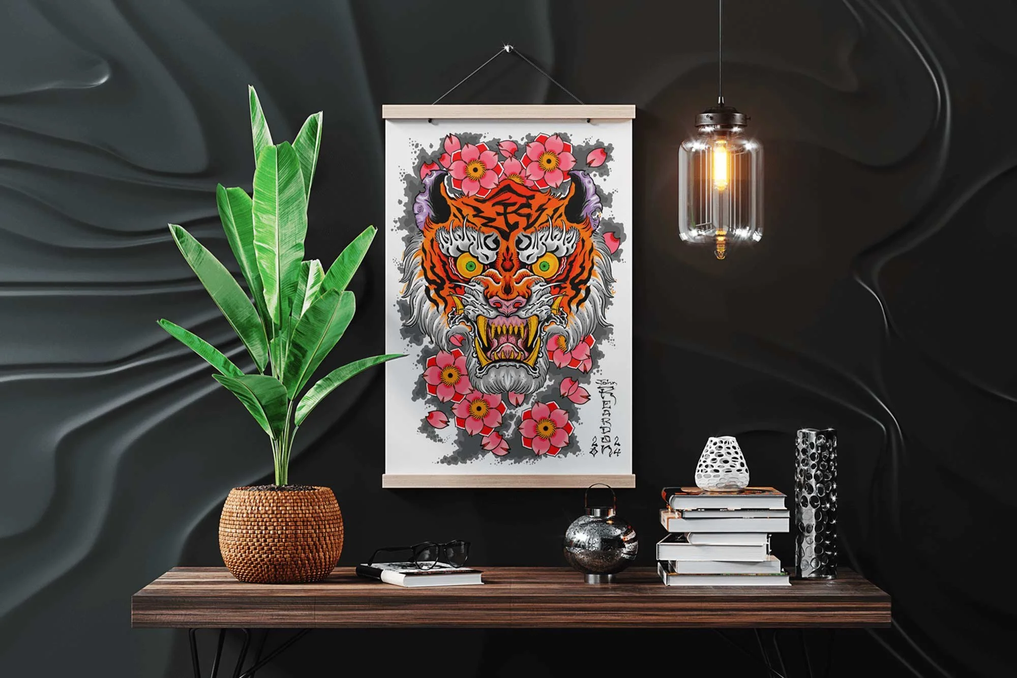 Tiger and flower color design by tattooer John Reardon hanging in a magnetic wooden frame on a black wall above a desk with decorations.