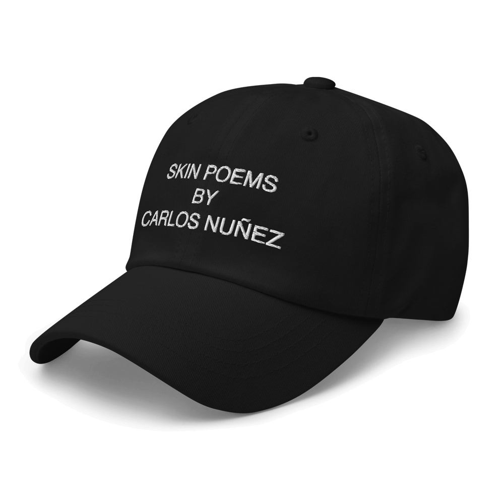 Side view of the Skin Poem hat by Carlos Nunez in black.