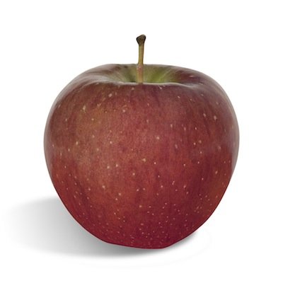 Mela rossa su sfondo bianco.