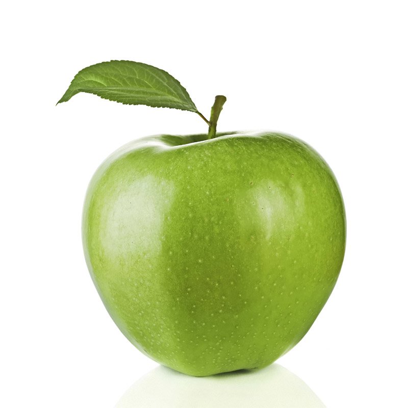 Mela verde su sfondo bianco