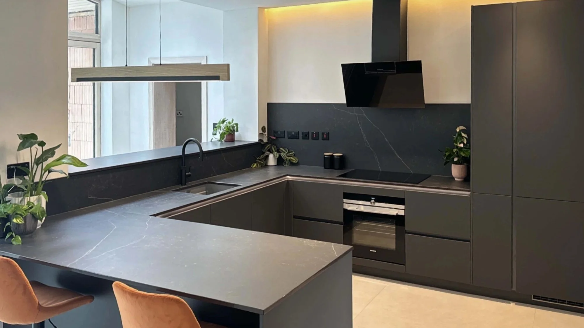 dark Dekton worktop and splashback
