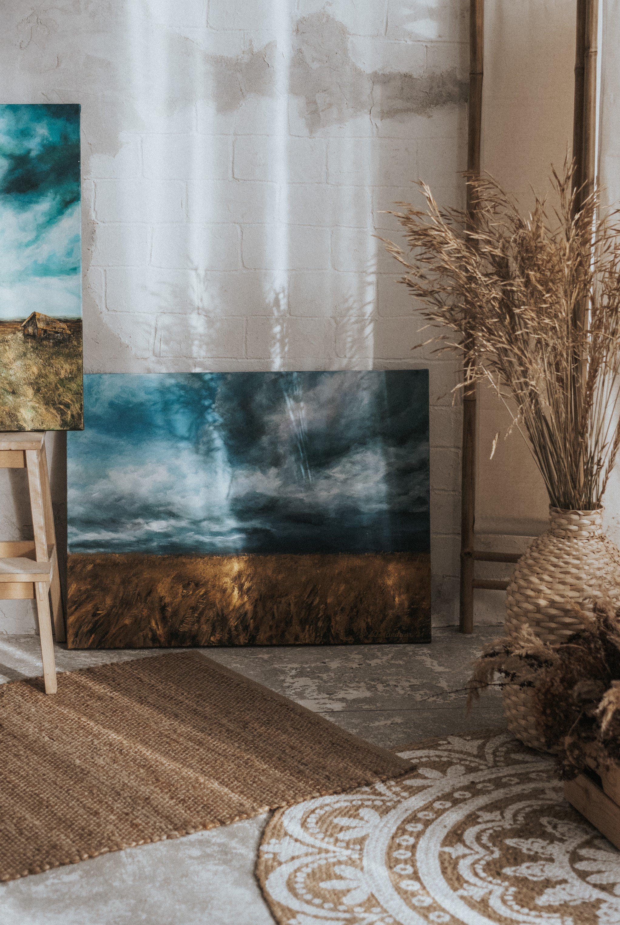 Original acrylic painting August Storm from Storm Cloud Collection by MandrikaArt. A golden field under dark blue stormy skies.