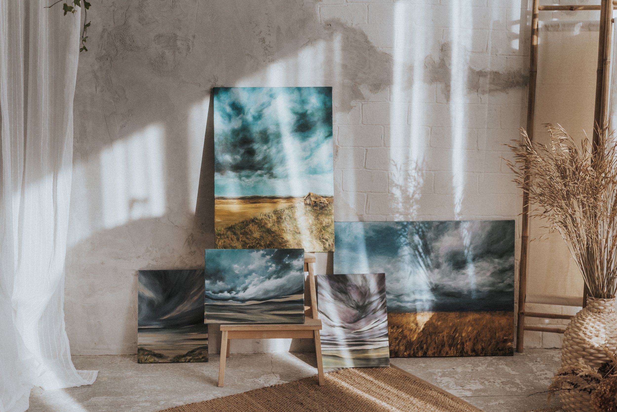 Original acrylic painting August Storm and other Storm Cloud Collection paintings by MandrikaArt. A golden field under dark blue stormy skies.