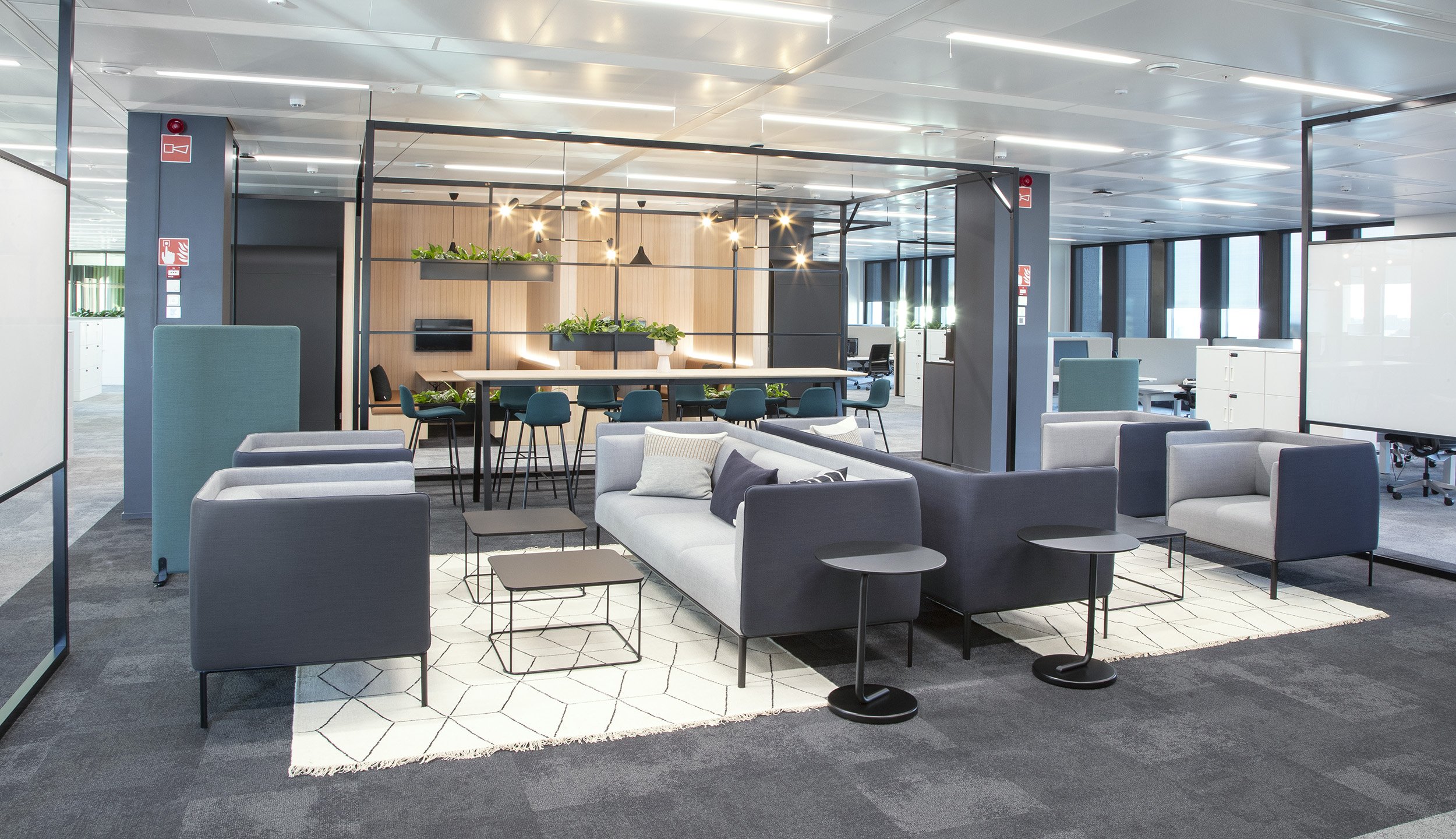 Desk and collaboration area of Global Tech Company in Espoo, Sweden. Designed by Designfolk Consultants.