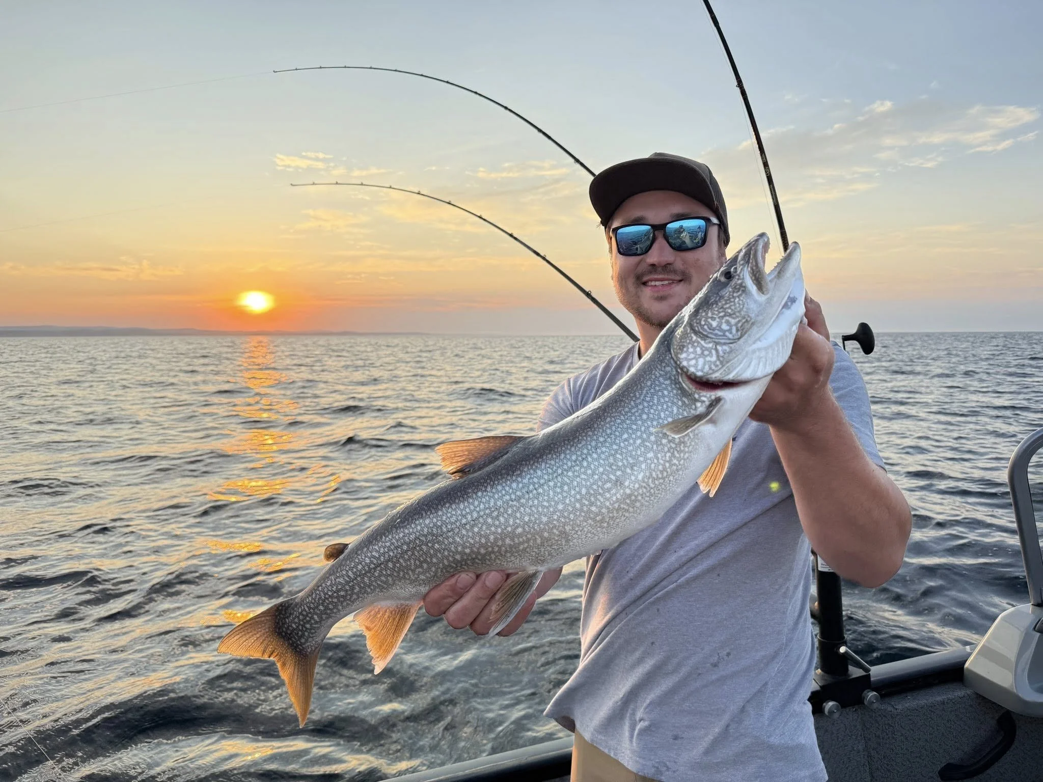 Customer holding a Lake Trout