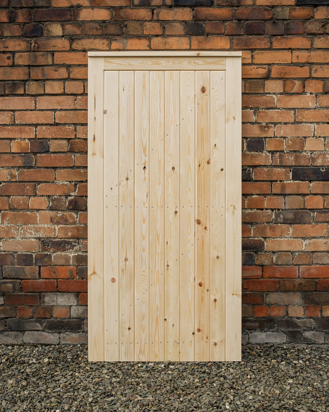 Fully framed T&amp;G redwood side gate

All joints mortise and tenon, glued and doweled

Heavy duty 20mm thick T&amp;G boards, 60mm thick frame, weathered top bar and sloped rails to help with rain water off

Chamfers added for little extra detail to