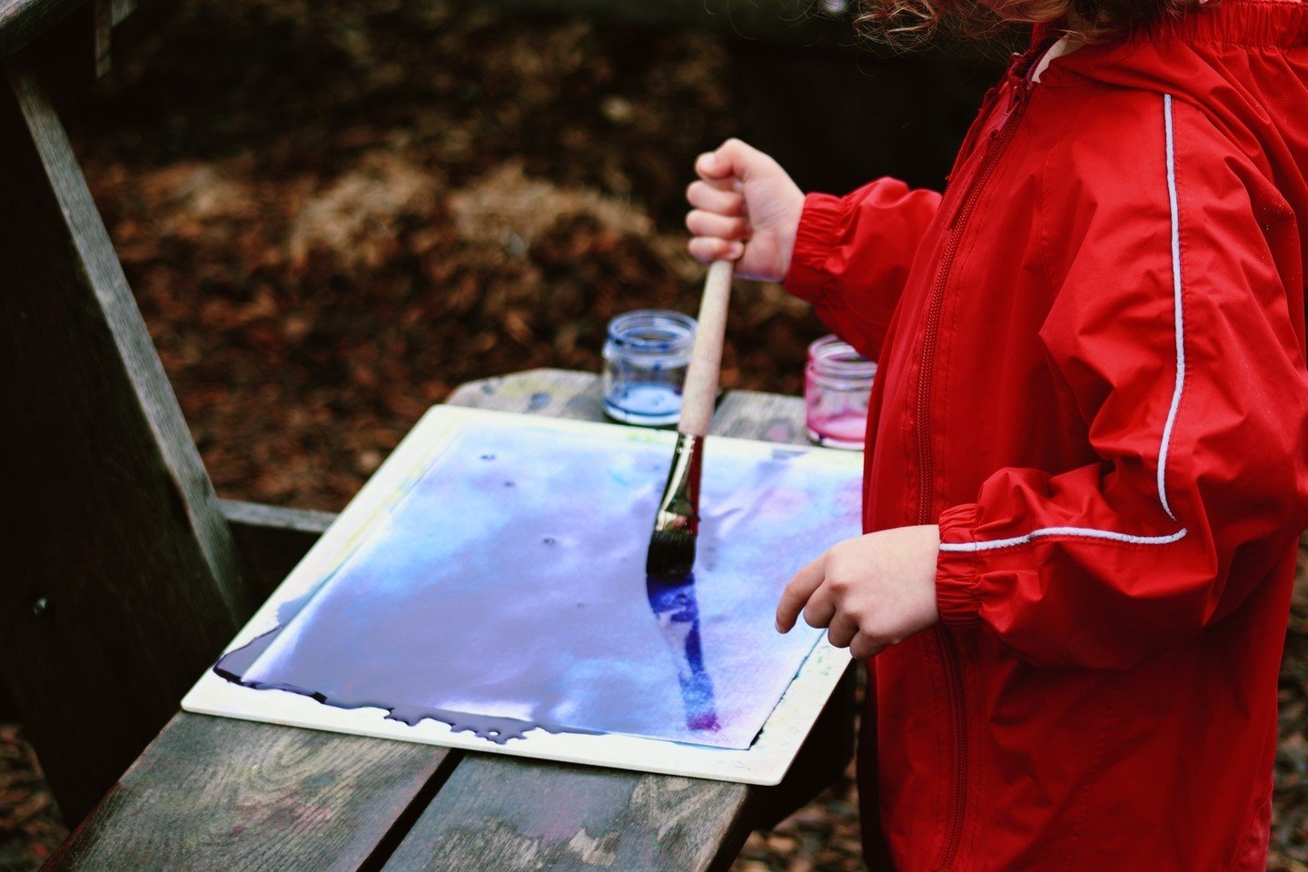 Why not paint outside in the rain? Our EC and elementary students learn wet-on-wet watercolor painting as part of their weekly curriculum. The youngest students begin with color studies, often matching the feeling or sense of a story they've just hea
