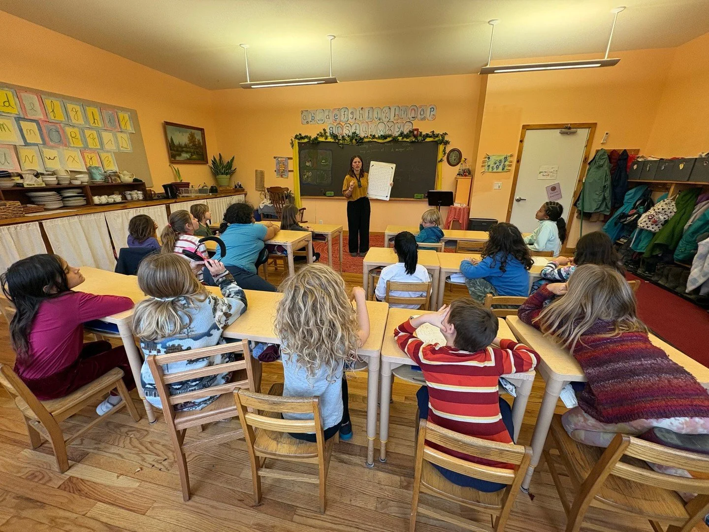 Grade Three has written a story together, and now they're using it to identify parts of speech. This is an excellent example of "whole to part" learning at our school: rather than learning the parts of speech, and then using those units to 