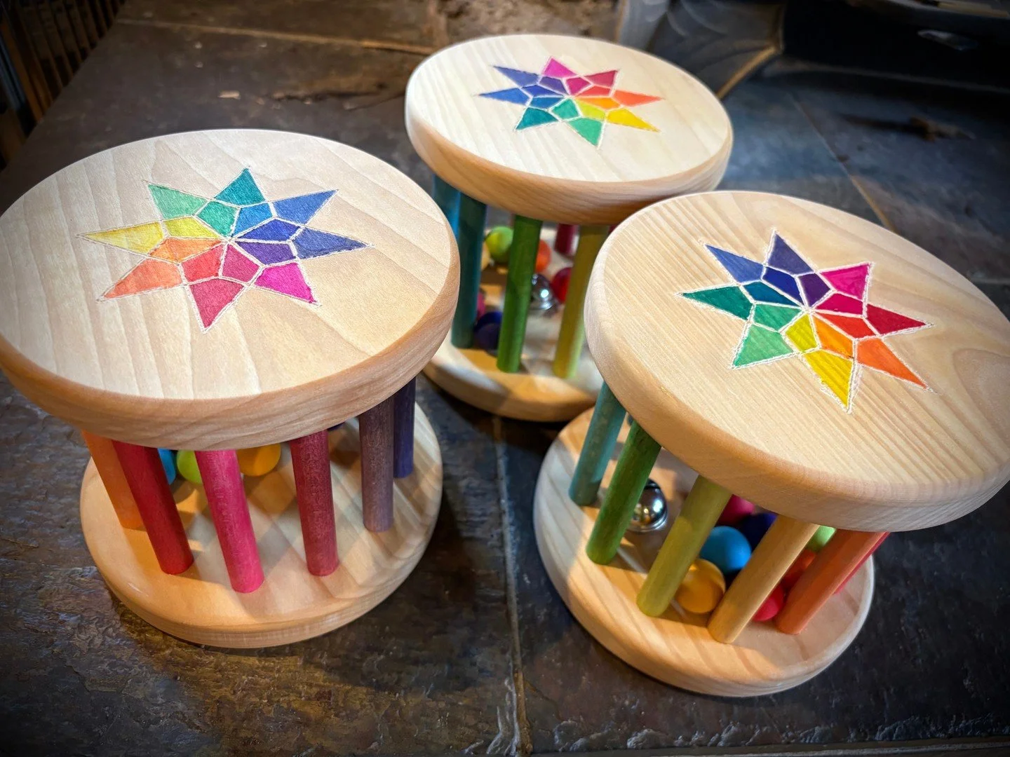 Keep an eye out for these beauties we're donating to favorite playspaces in Ithaca! Thank you to the 8th grade artist who engraved and painted them for us!⁠
⁠
@greenstar_coop @fingerlakestoylibrary @grimmswoodentoys @atoygarden @thewoodenwagon⁠
#rain