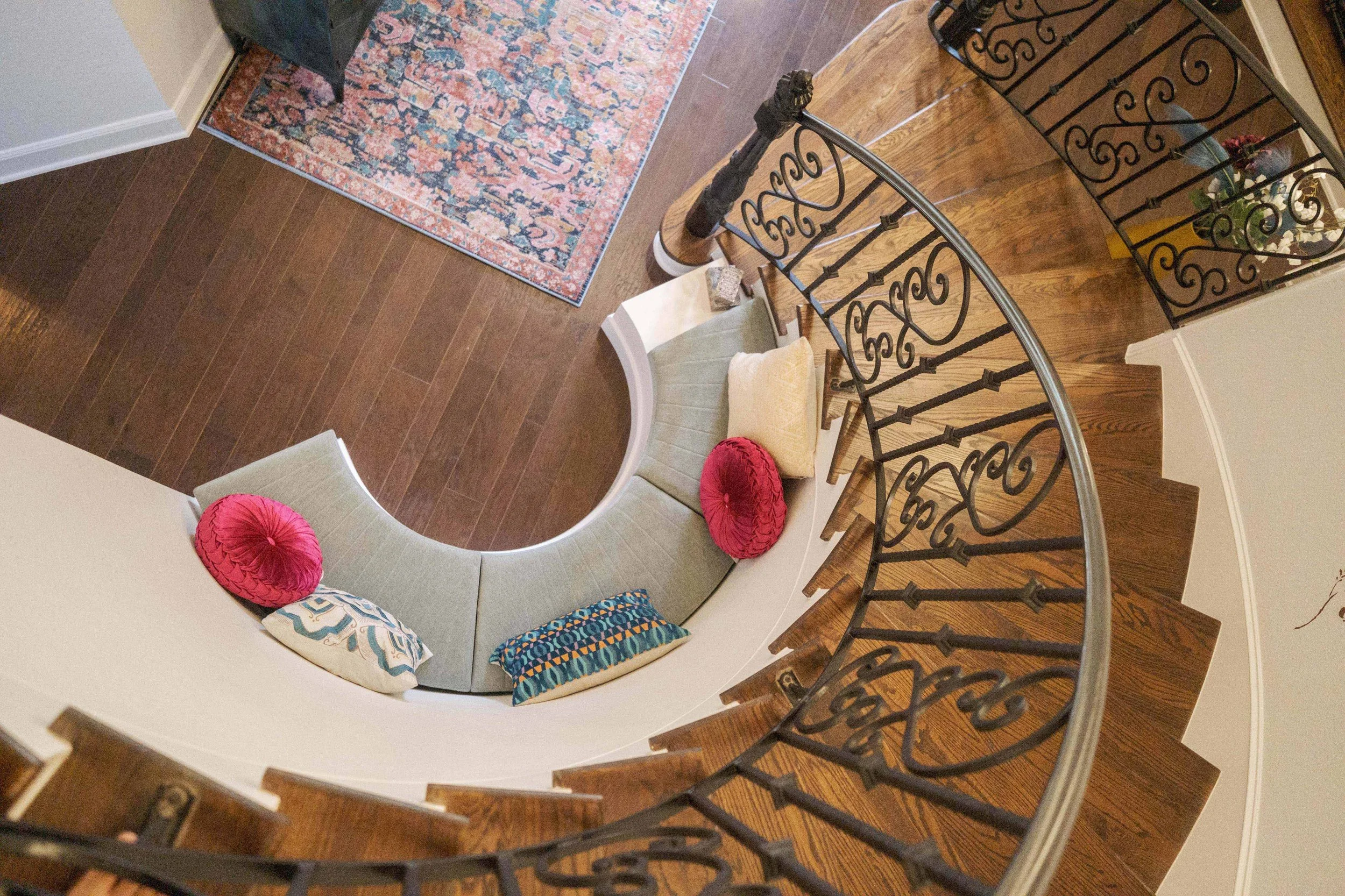 A unique view of the built in benches from the curved staircase