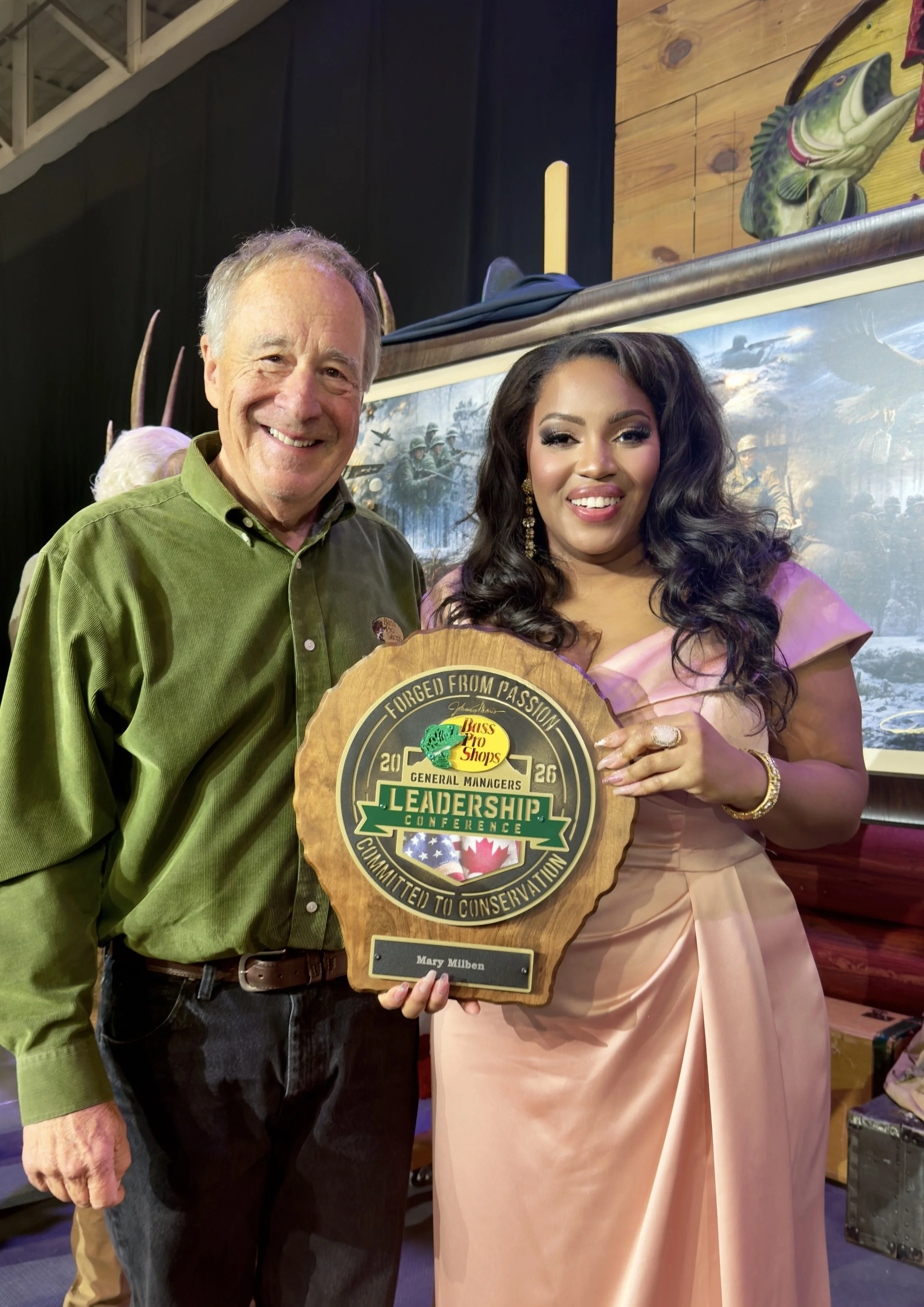 May 6th, Mary was the featured entertainment for the 2026 Bass Pro and Cabela's General Managers Conference. Pictured with Bass Pro Founder Johnny Morris.