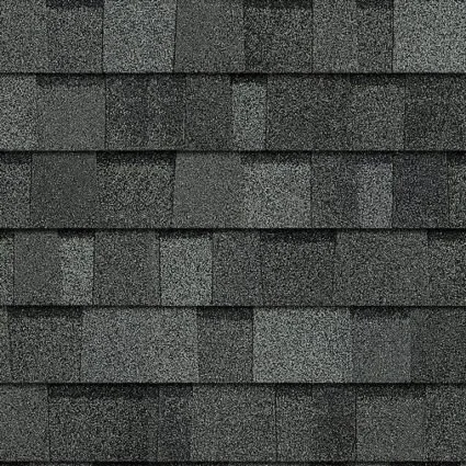 Close-up texture of dark gray architectural asphalt composition roof shingles
