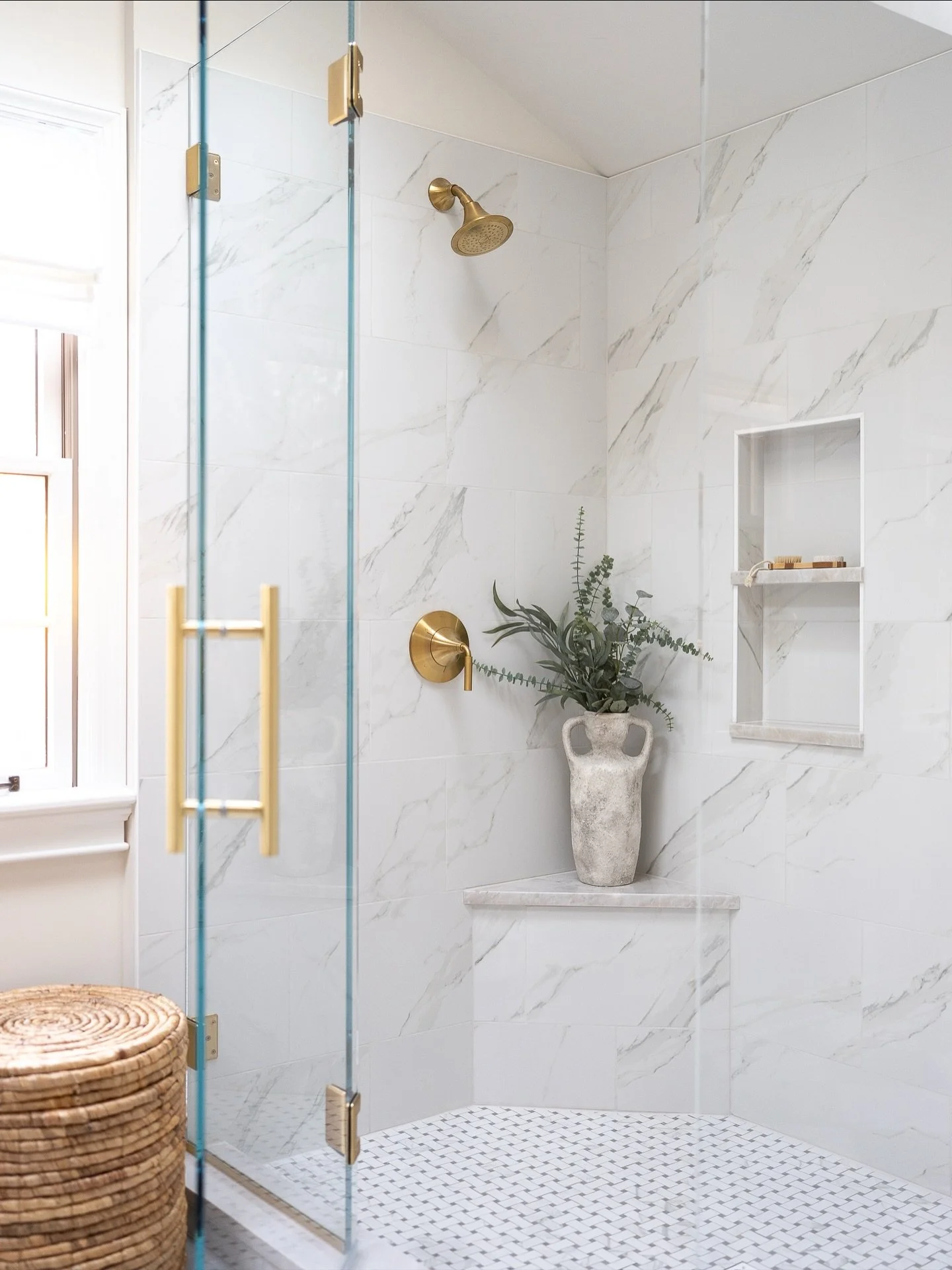 When we first walked into this bathroom, the oversized jacuzzi tub was taking up all the prime real estate &mdash; but none of it was supporting the way these wonderful homeowners truly live.

So we rethought it.
Reclaimed the footprint.
And created 